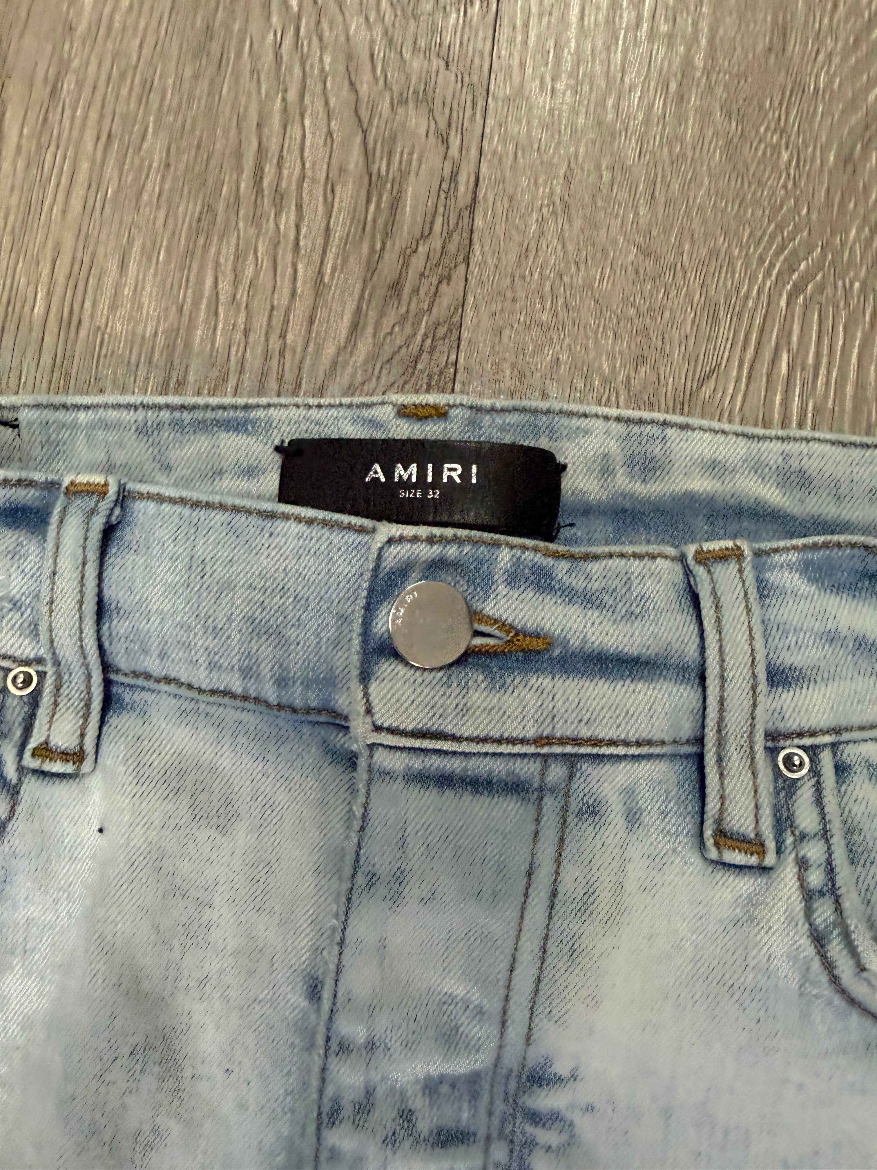Amiri Light Wash Art Patchwork Thrasher Jeans
