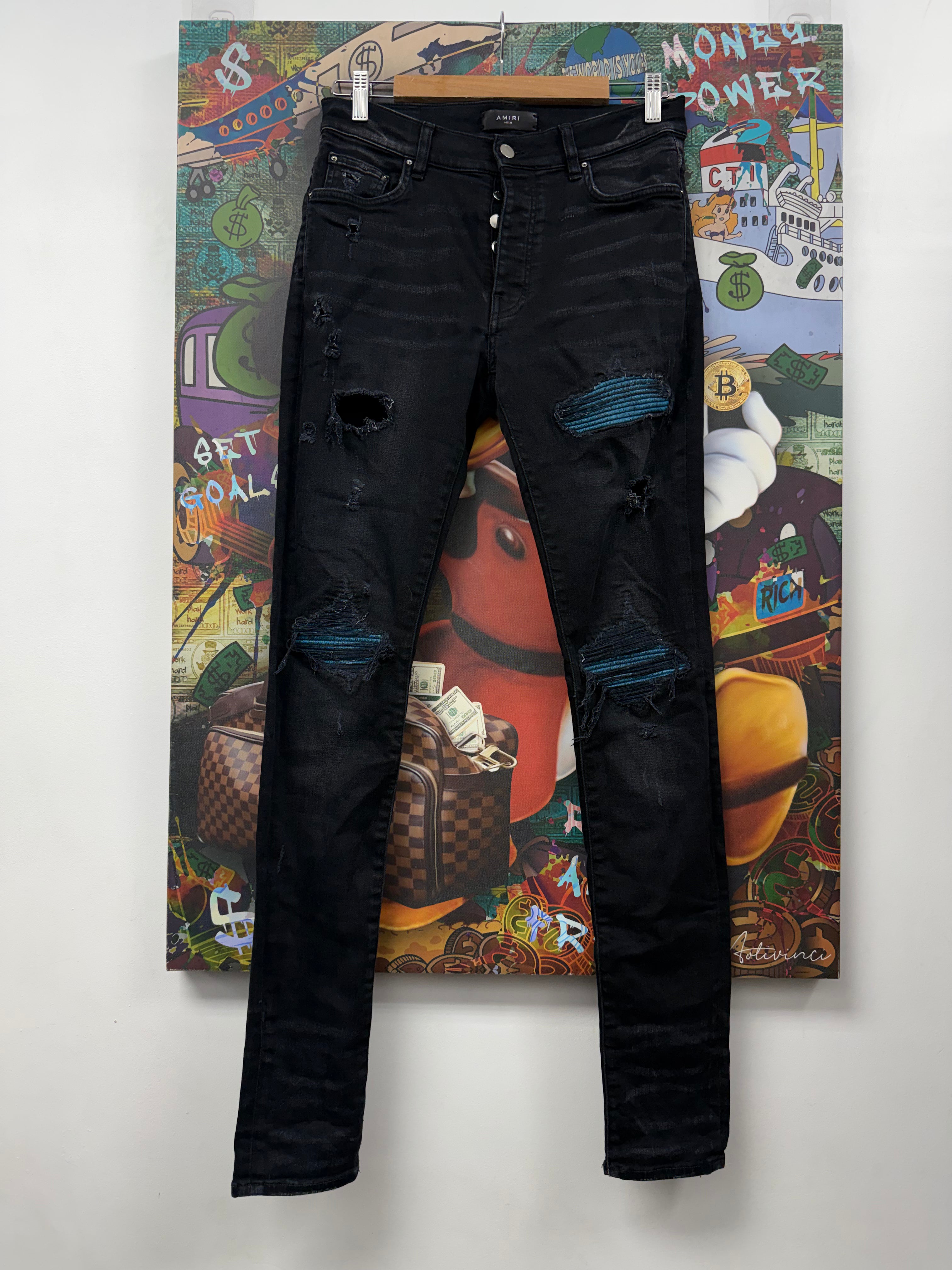 Amiri MX1 Black Wash Blue Crackle Patch Jeans