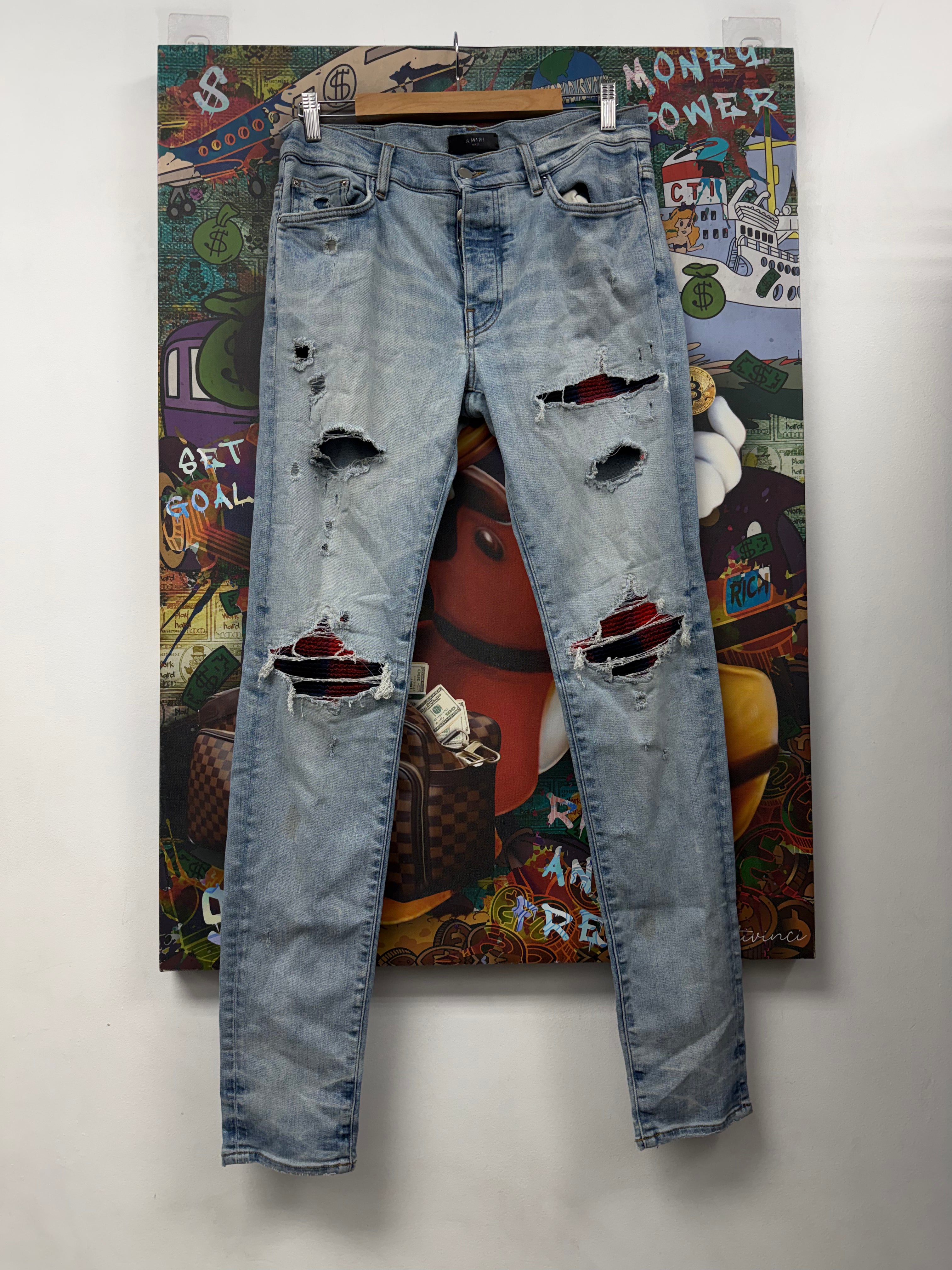 Amiri MX1 Light Wash Navy Red Patch Jeans