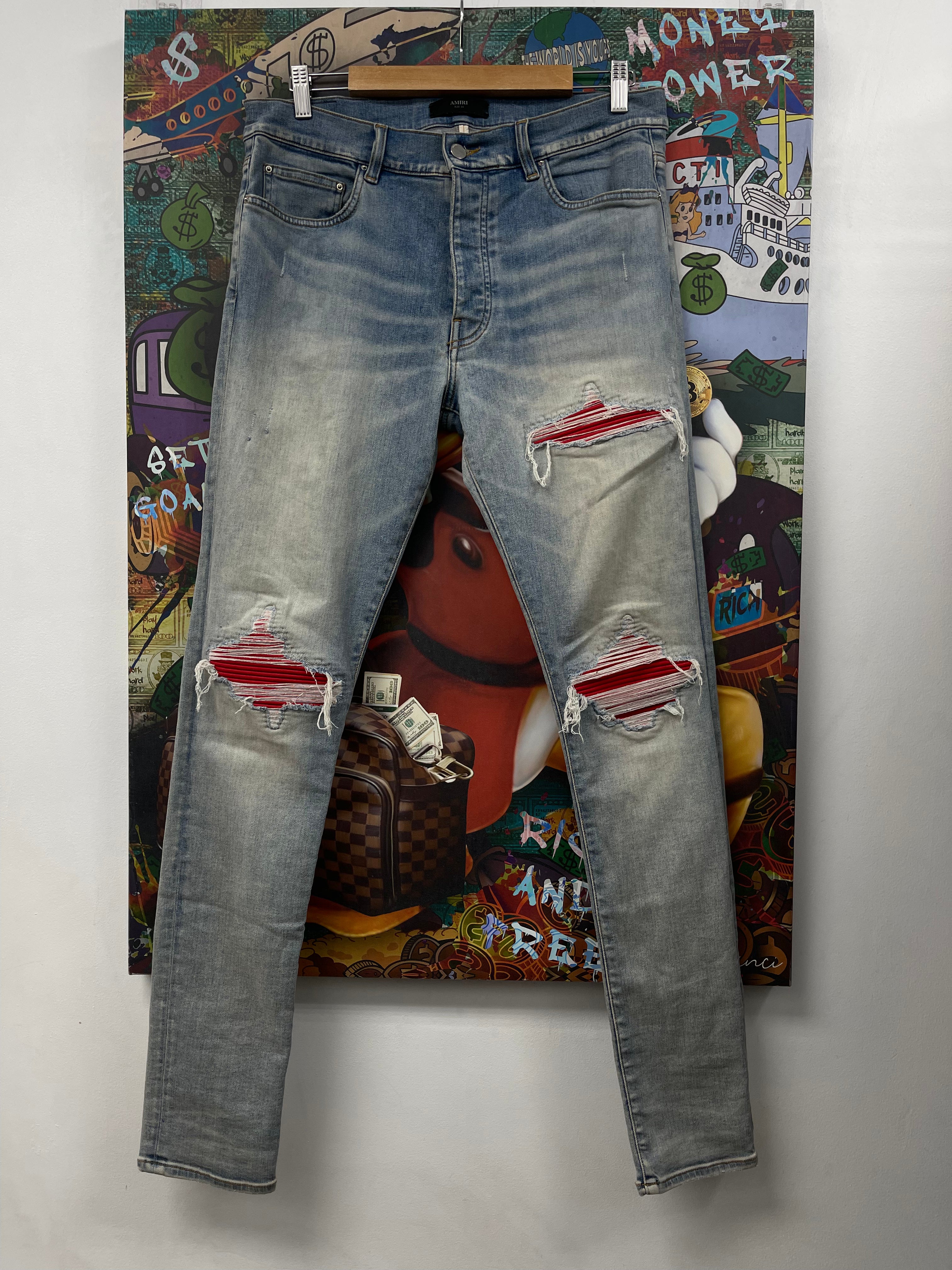 Amiri MX1 Light Wash Red Patch Jeans