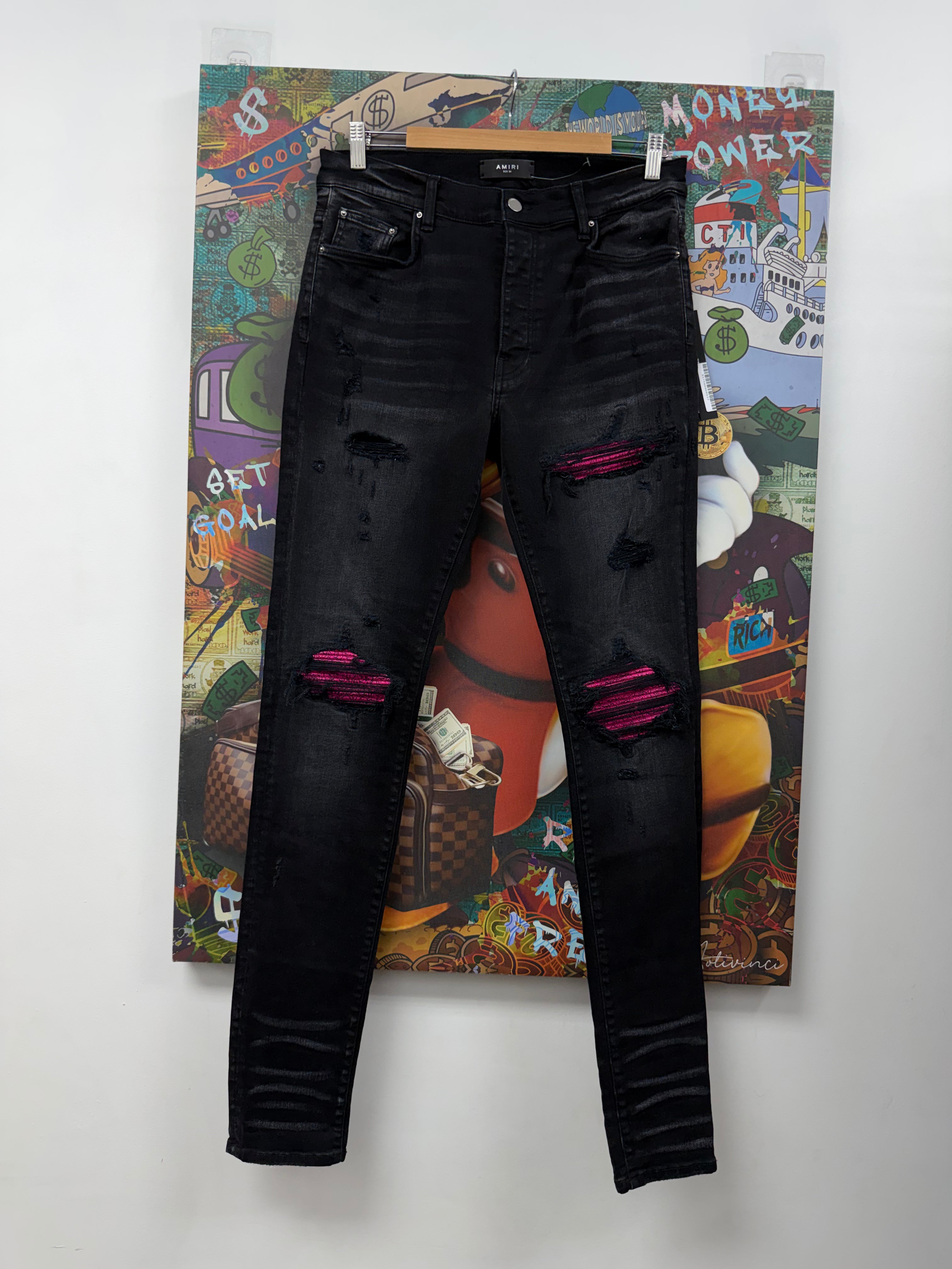 Amiri MX1 Black Wash Pink Crackle Patch Jeans