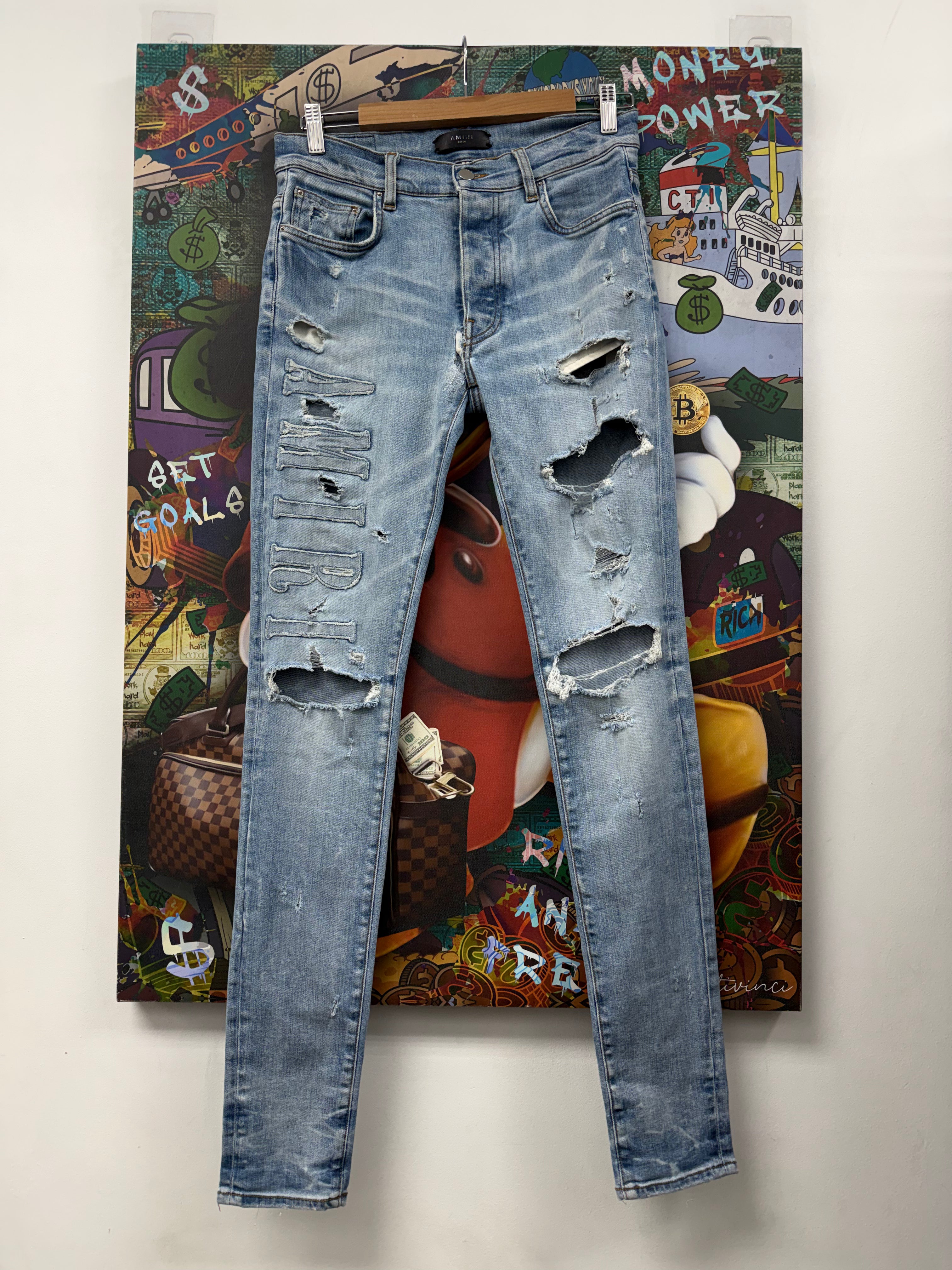 Amiri Light Wash Denim Applique Side Logo Jeans
