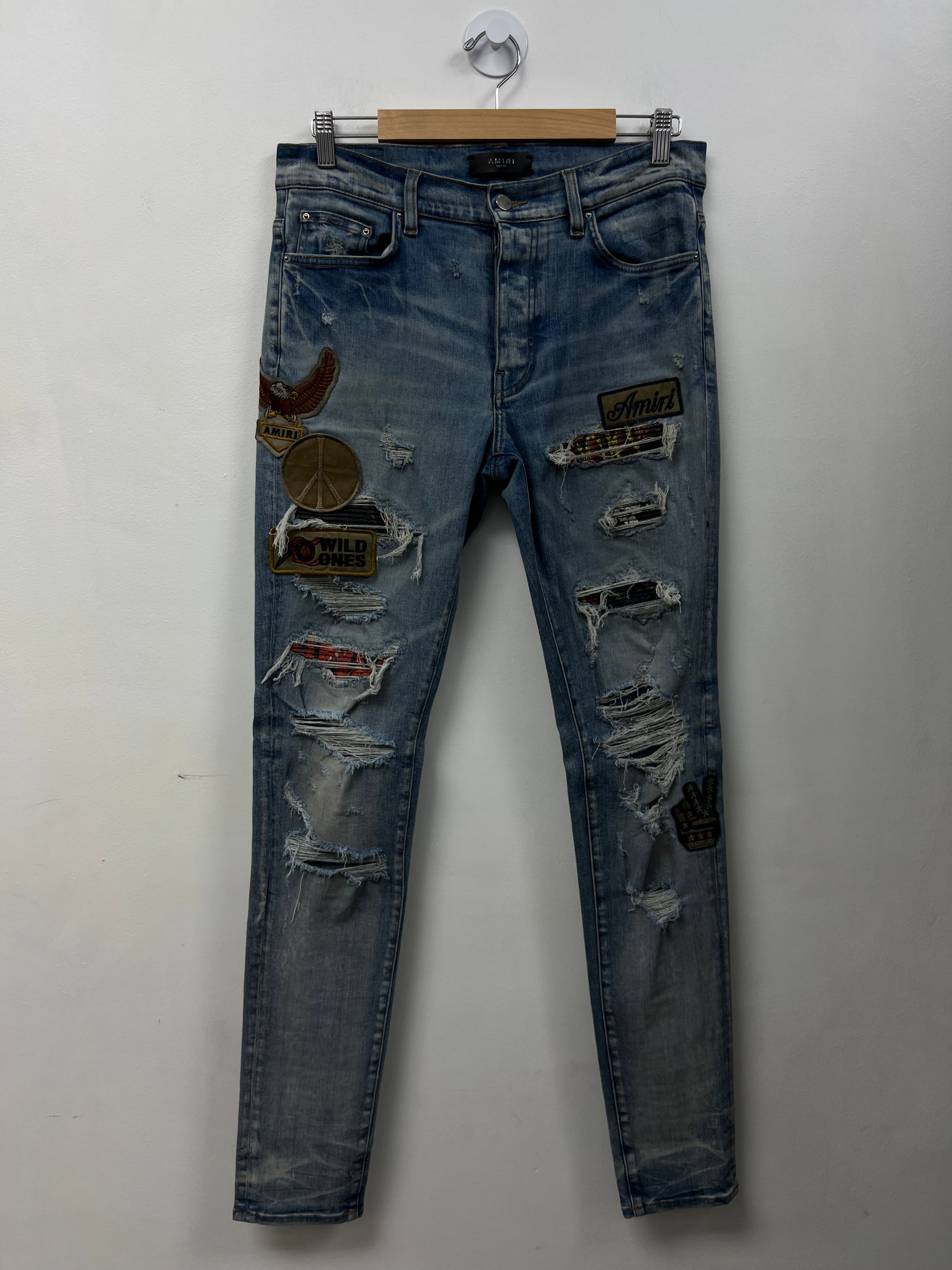 Amiri Light Wash Eagle Biker Patchwork Jeans
