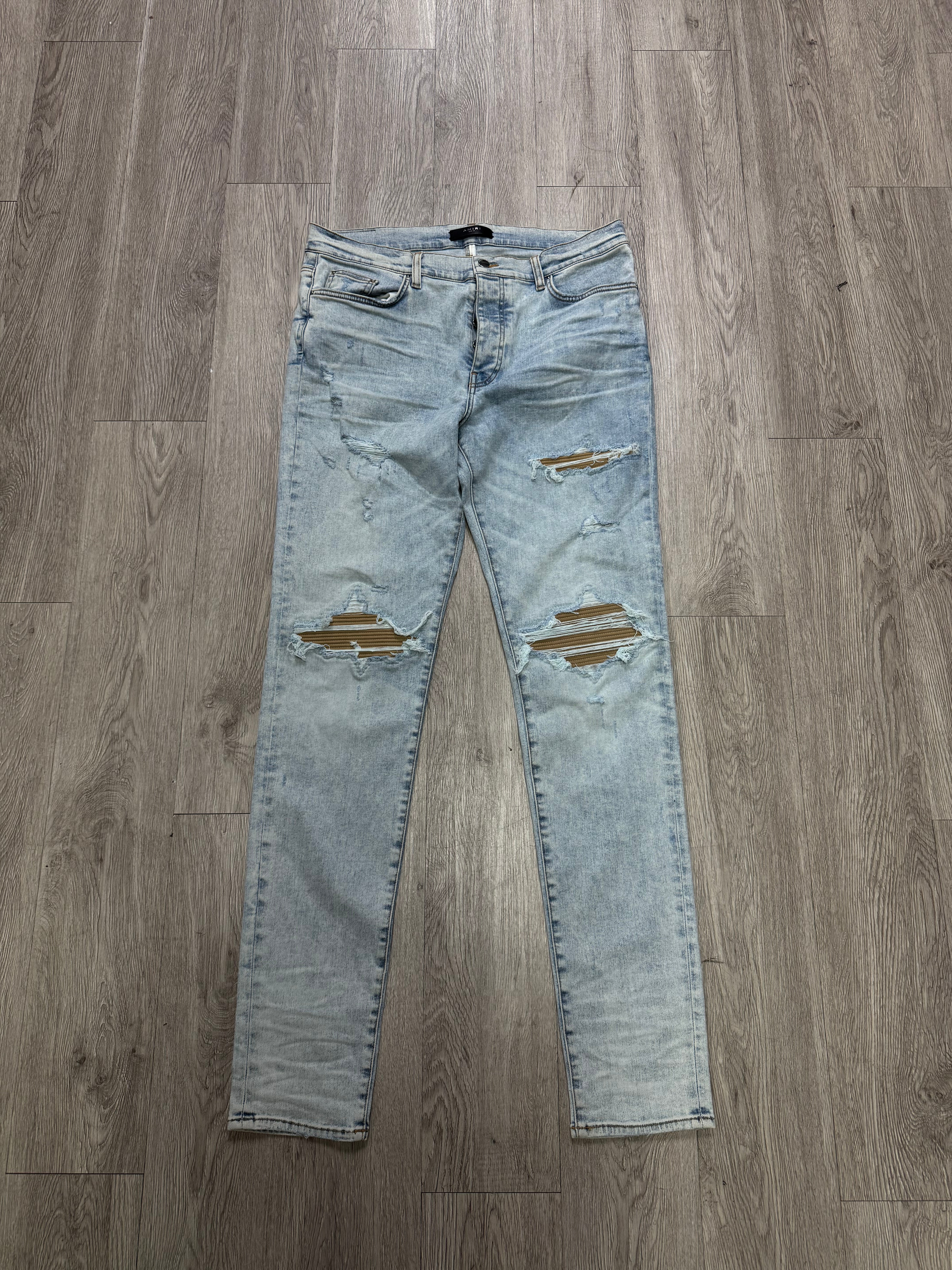 Amiri MX1 Light Wash Tan Suede Patch Jeans
