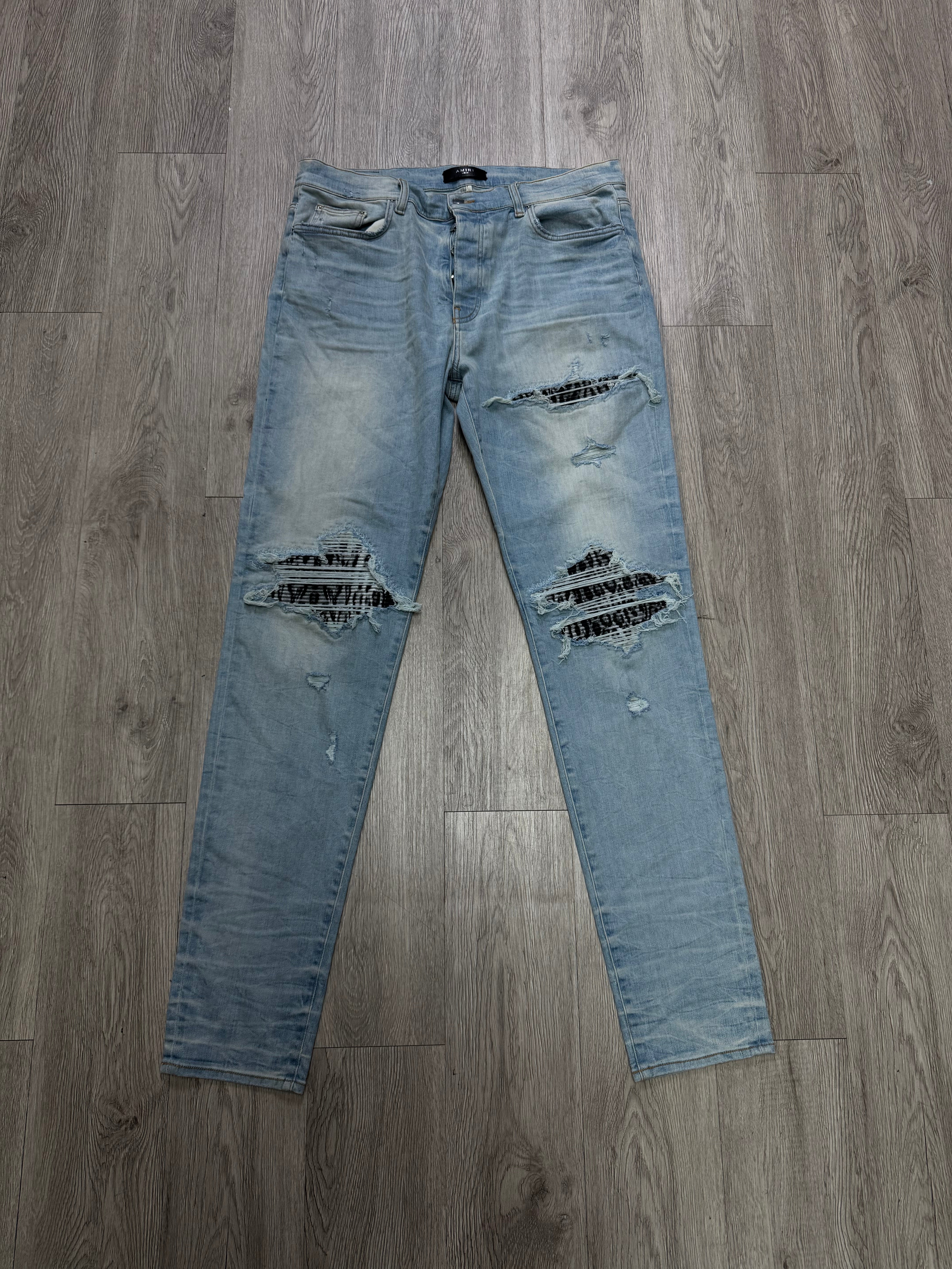 Amiri MX1 Light Wash Zebra Patch Jeans