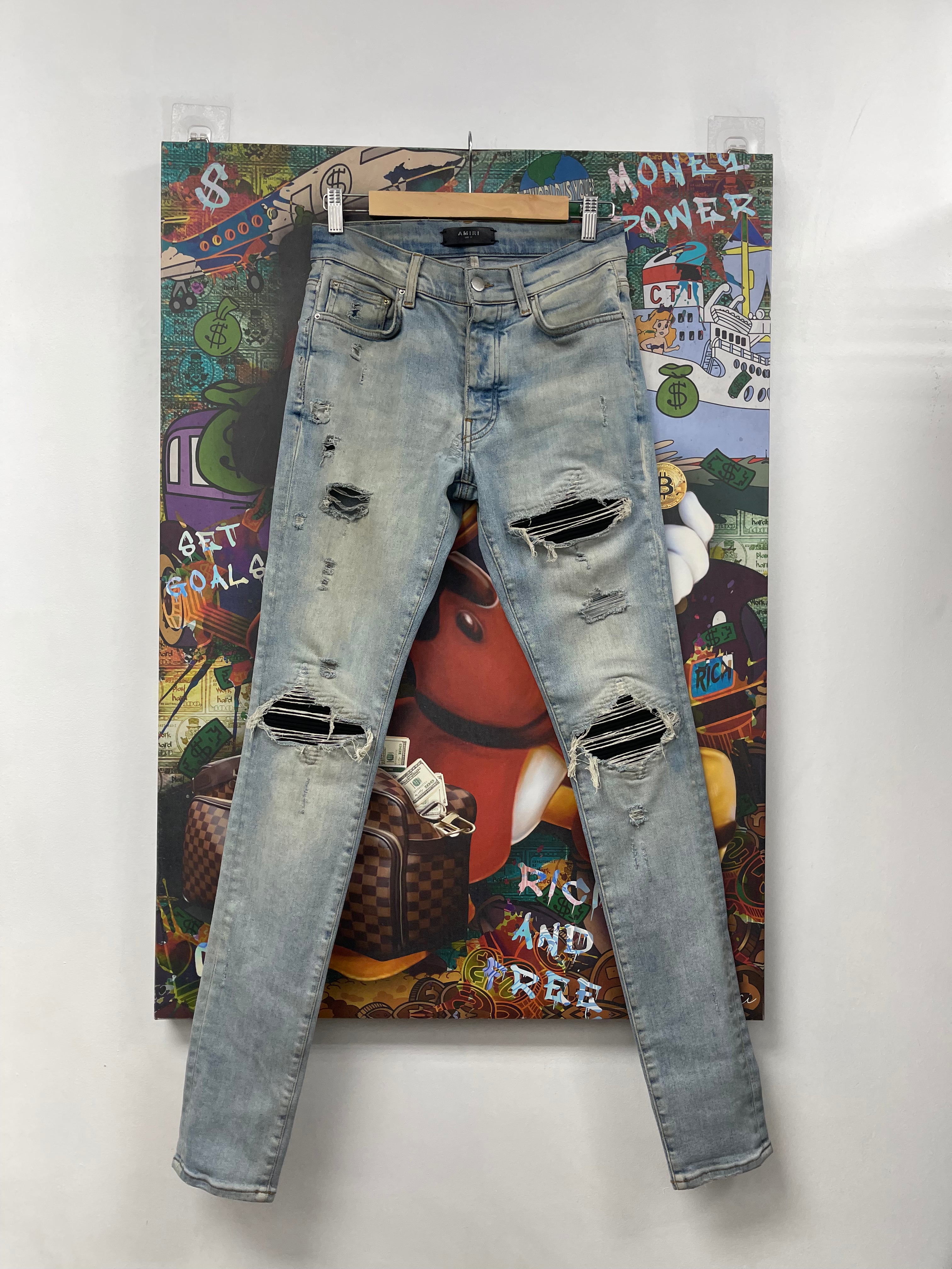 Amiri MX1 Light Wash Black Suede Patch Jeans