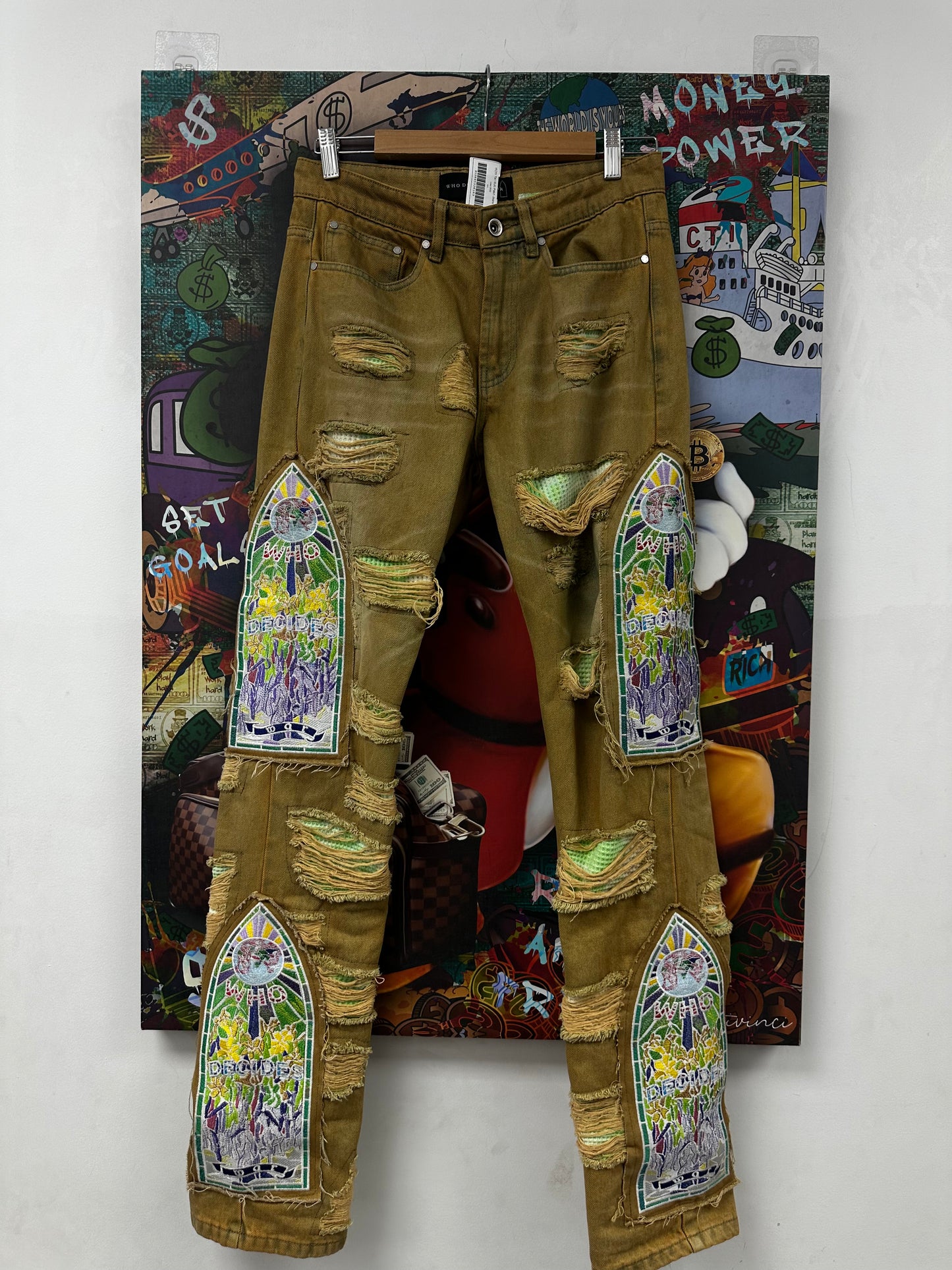 WDW Tan Multi Patch Jeans Used 28 N/A