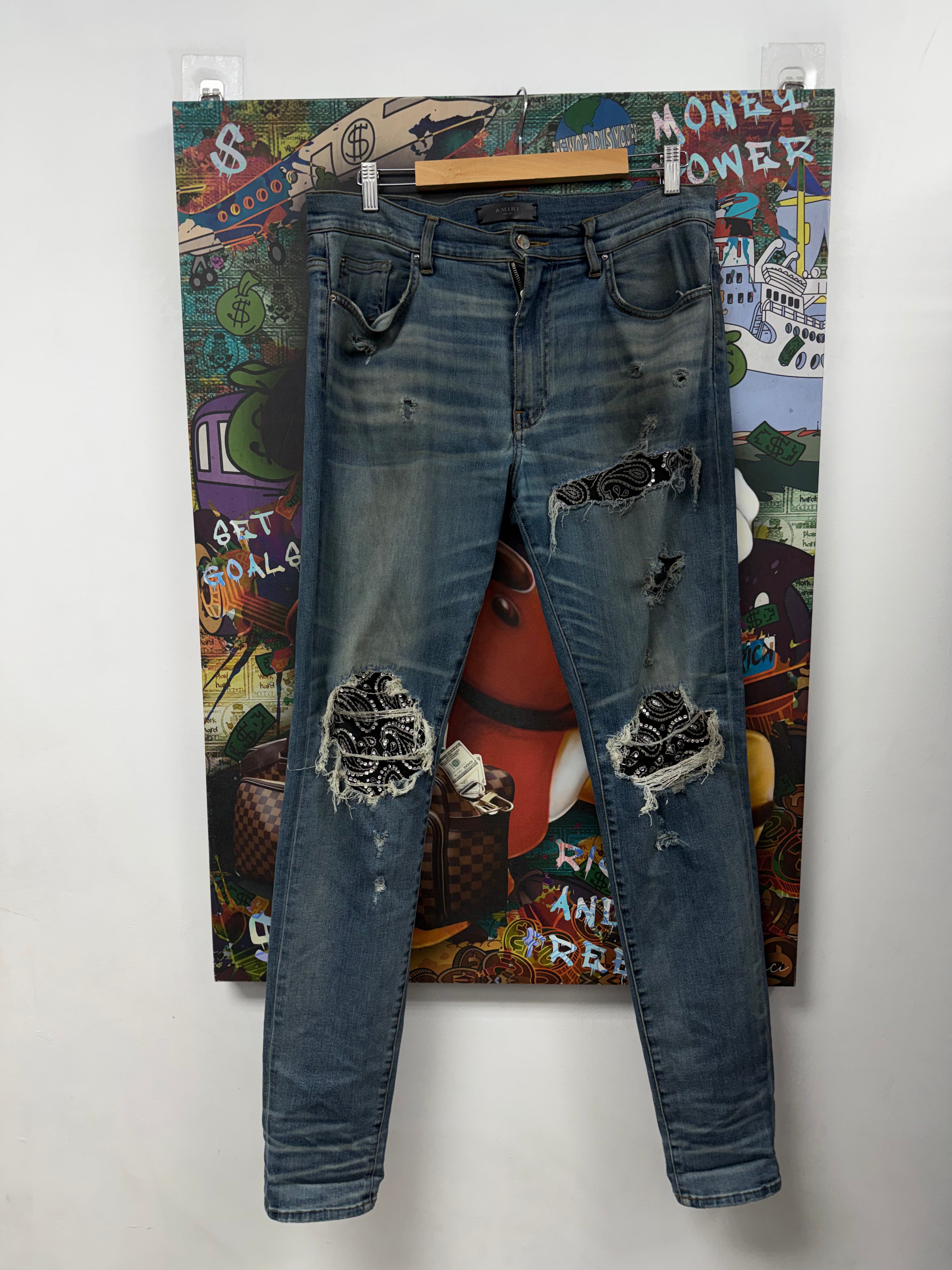 Amiri MX1 Light Wash Music Patch Jeans