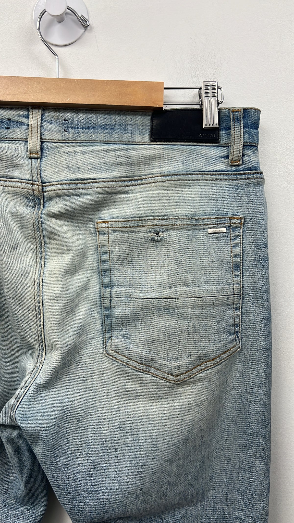 Amiri MX1 Light Wash Black Suede Patch Jeans