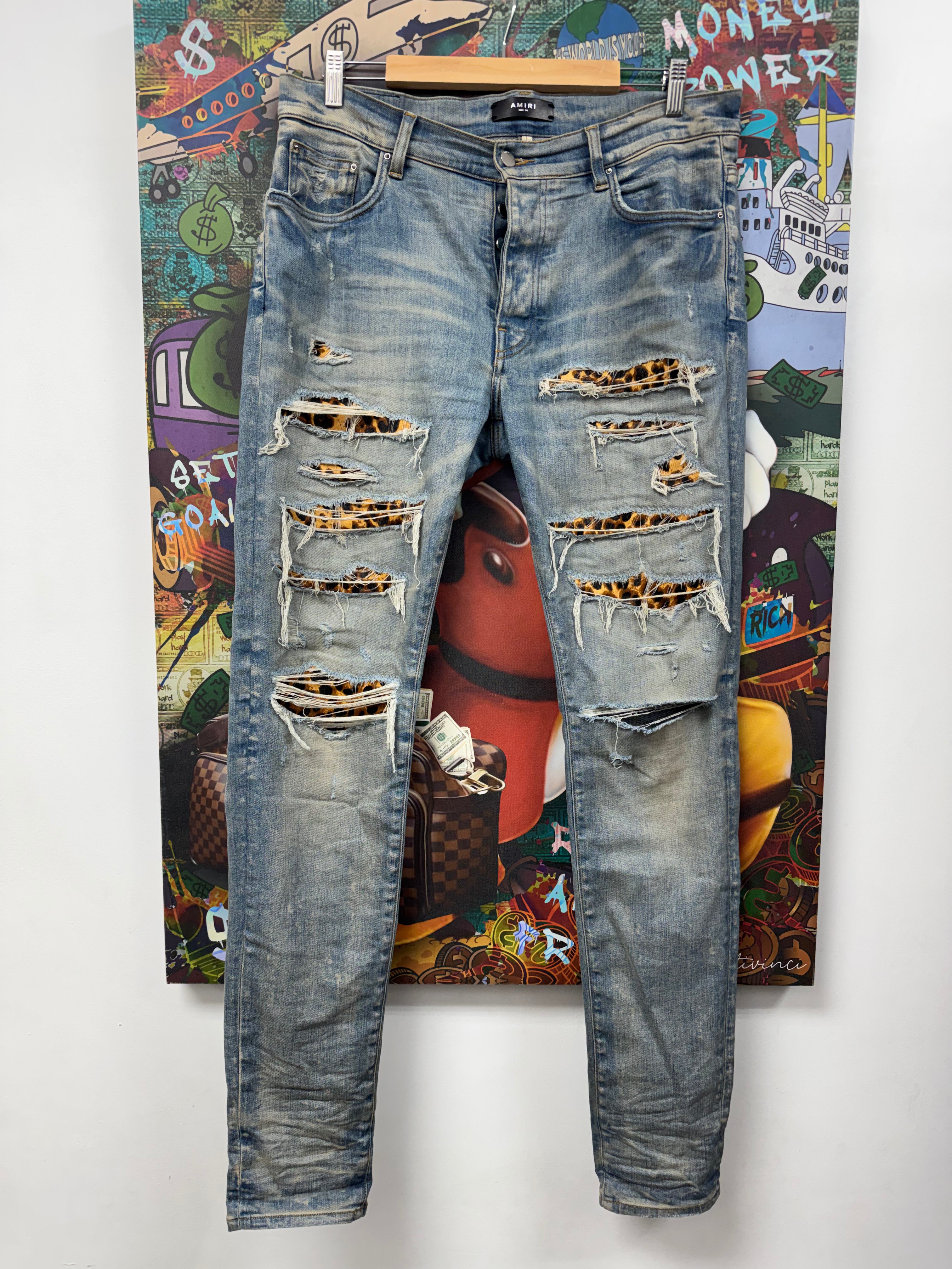 Amiri Light Wash Cheetah Thrasher Patch Jeans