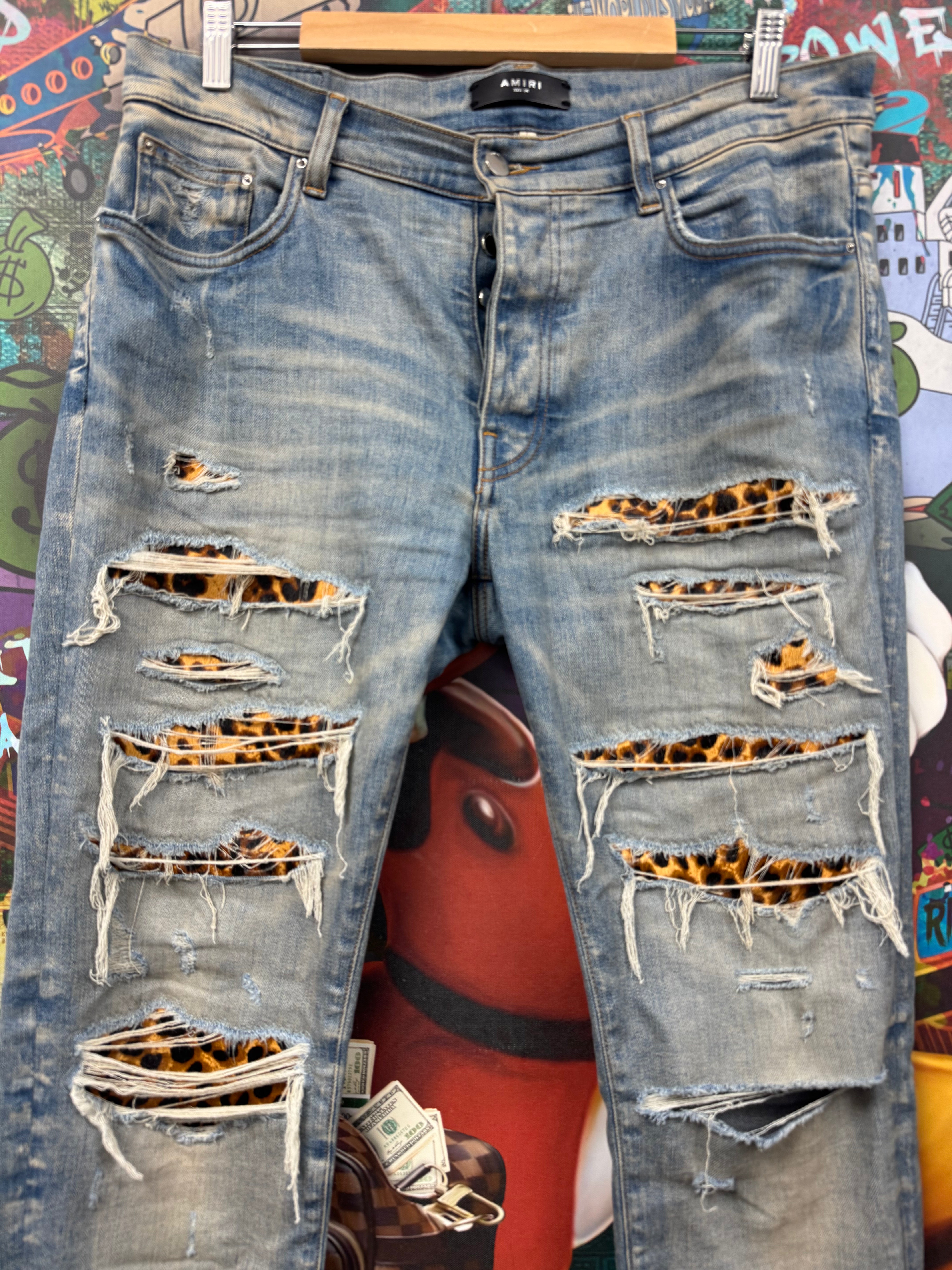 Amiri Light Wash Cheetah Thrasher Patch Jeans
