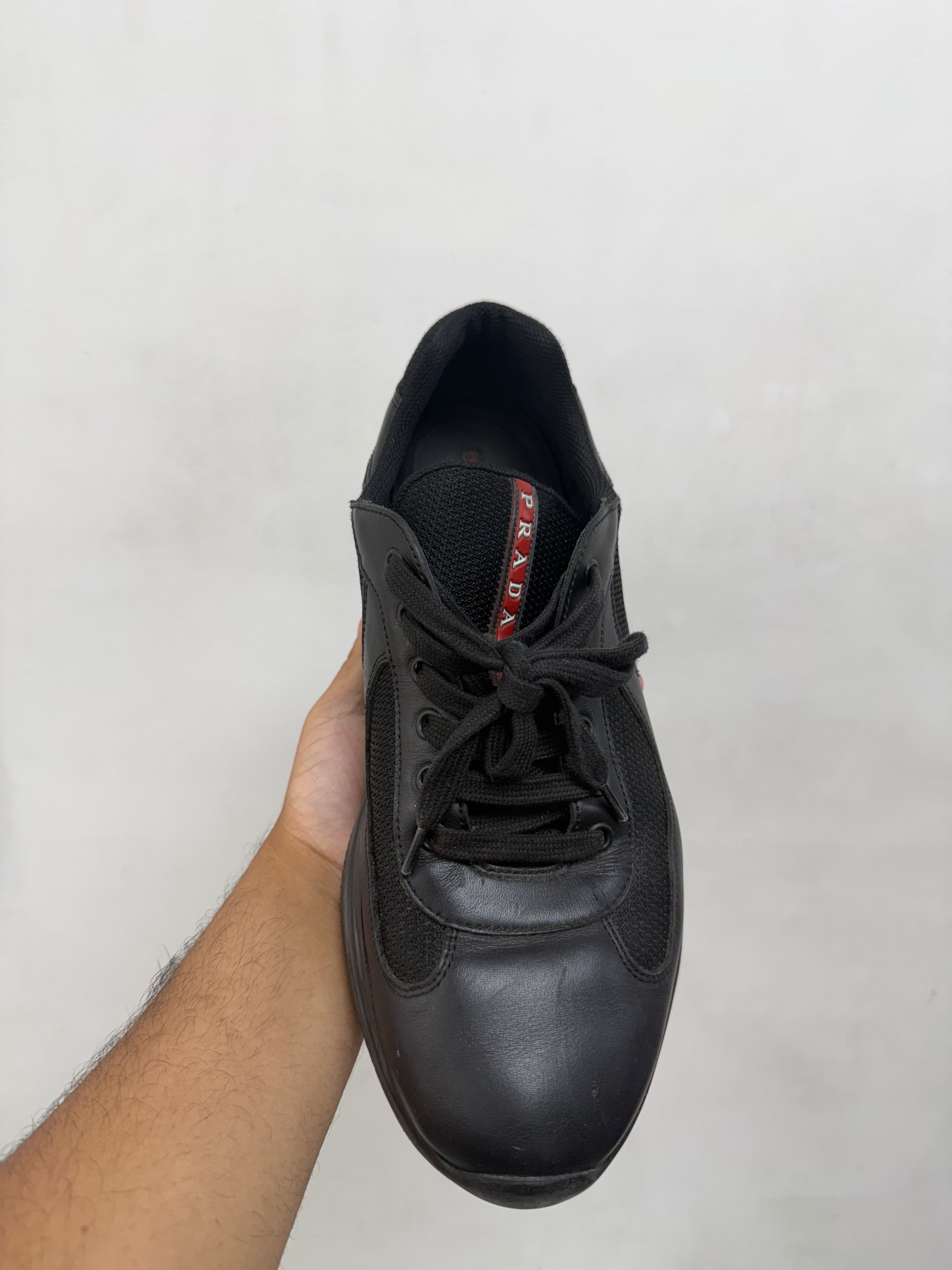 Prada Black Leather Cup Sneakers