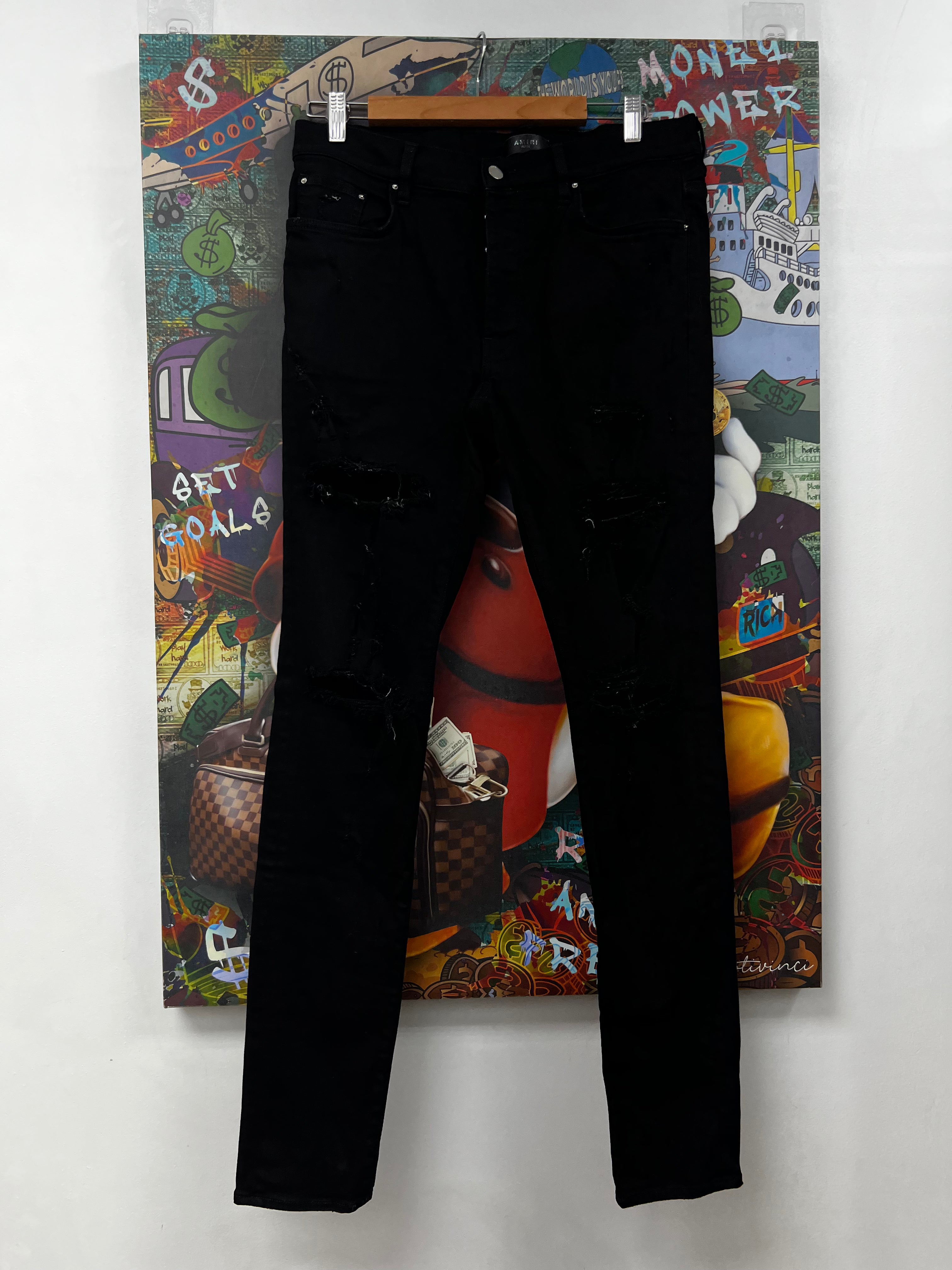 Amiri Black Ripped Thrasher Jeans