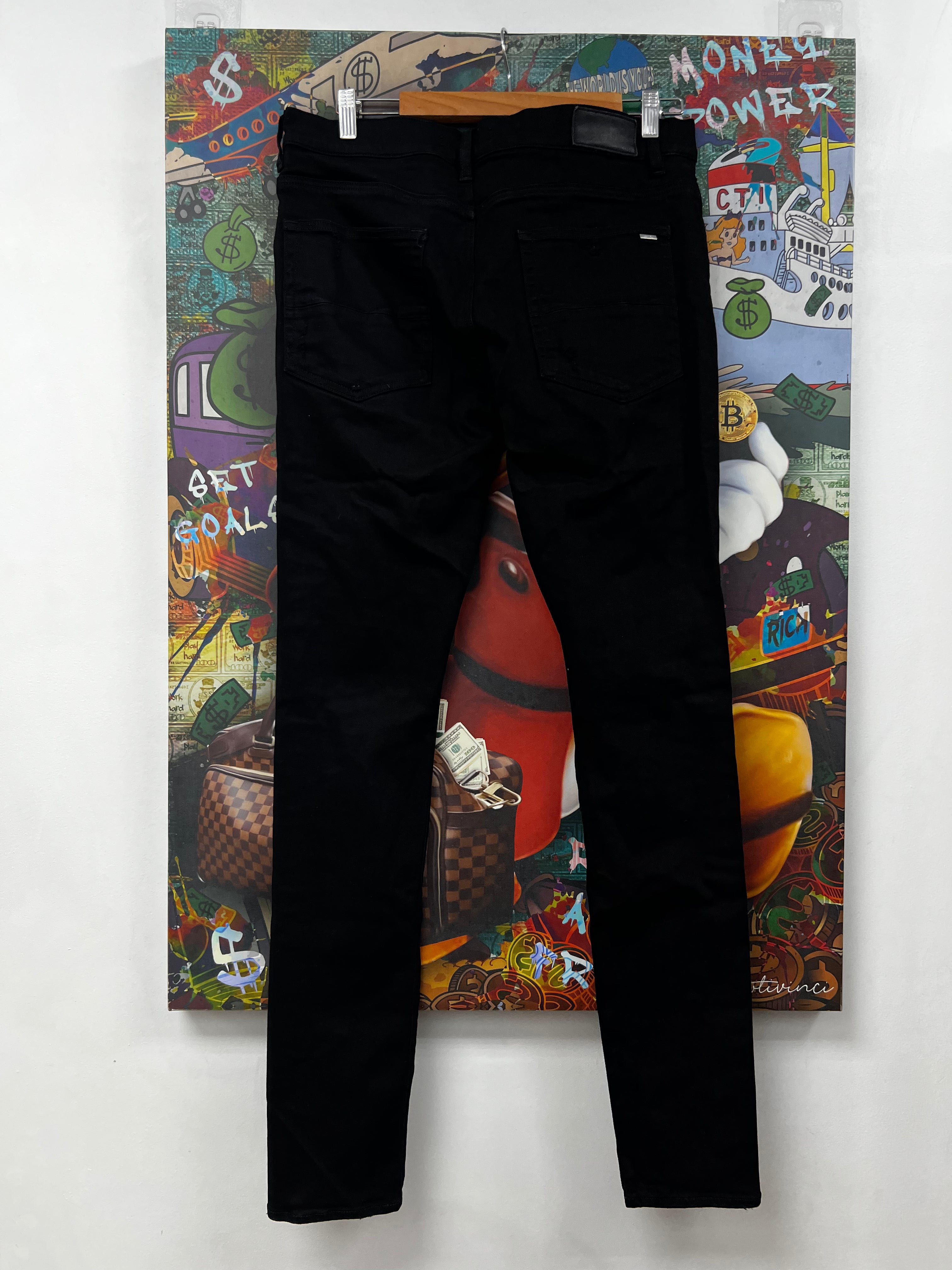 Amiri Black Ripped Thrasher Jeans