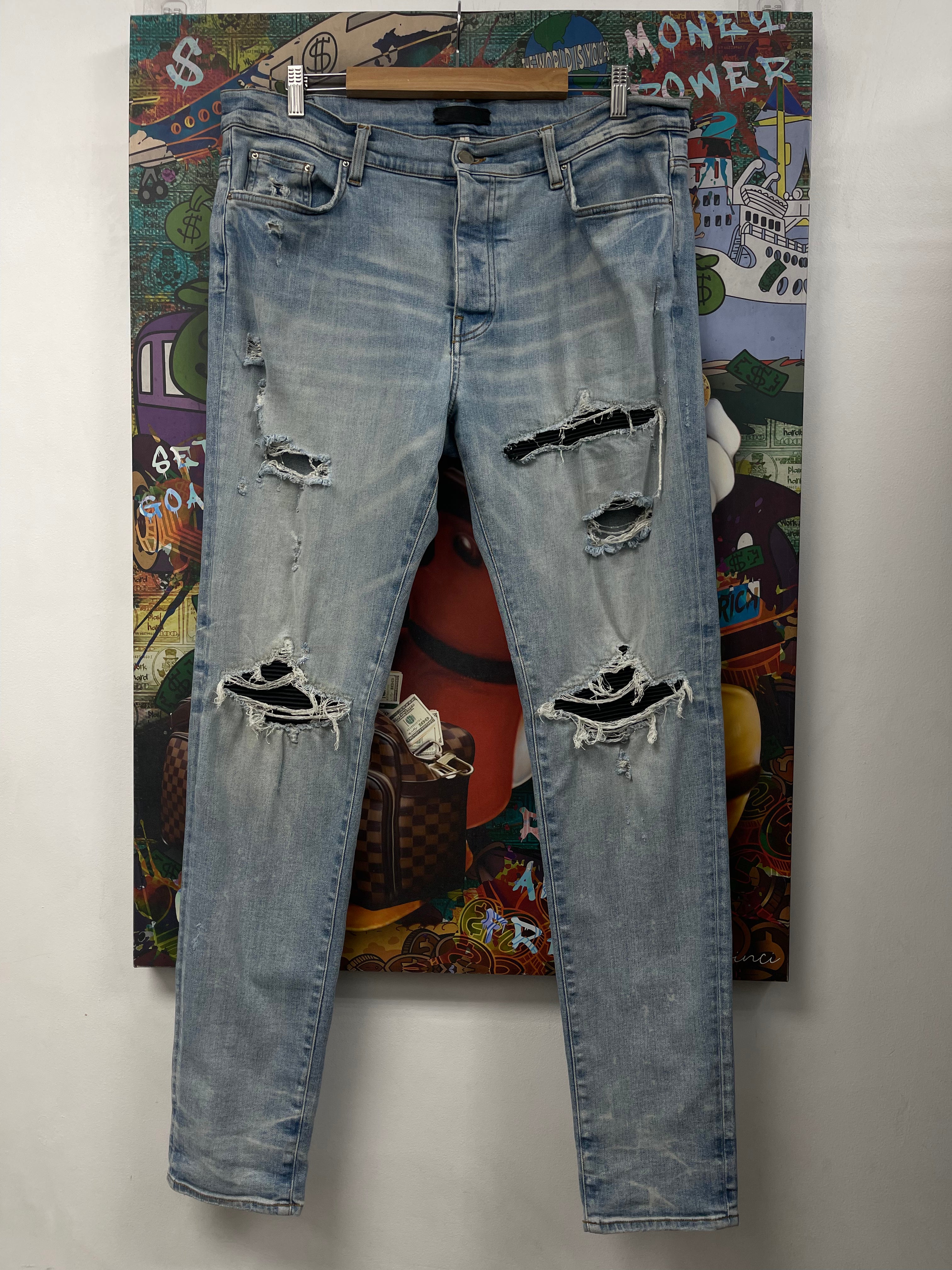 Amiri MX1 Light Wash Black Patch Jeans