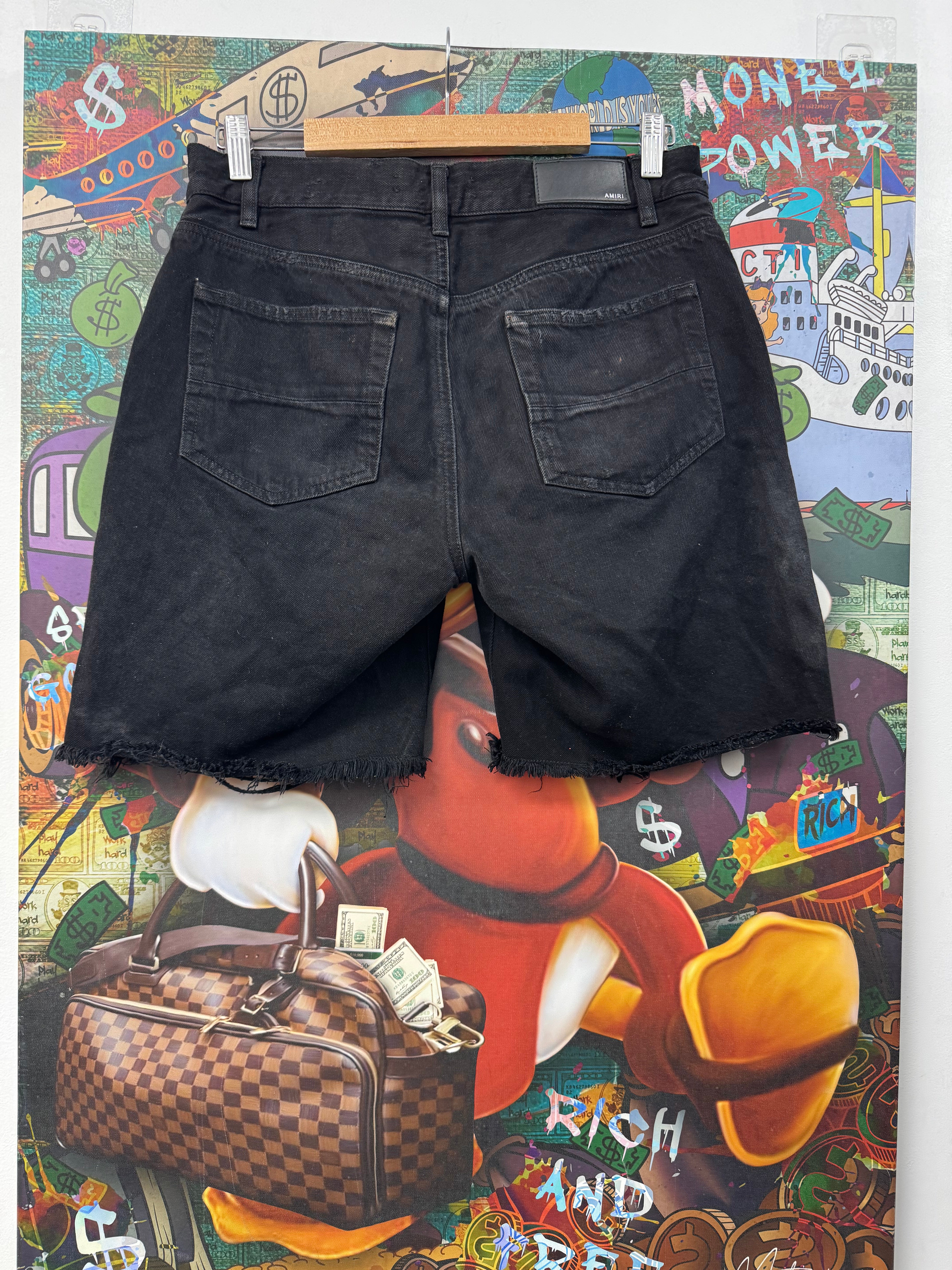 Amiri Black Wash Ripped Jean Shorts