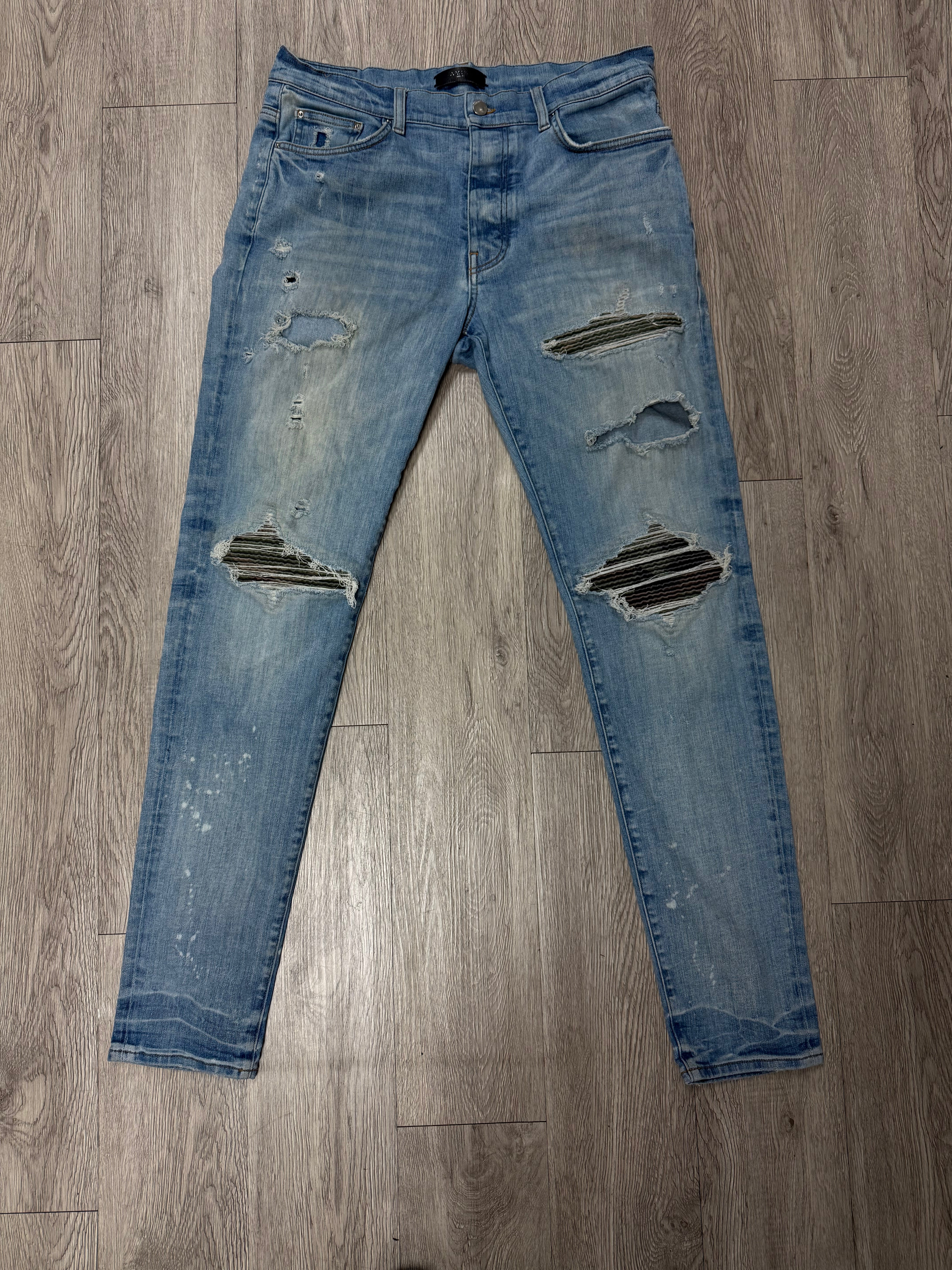 Amiri Mx1 Light Wash Camo Patch Jeans