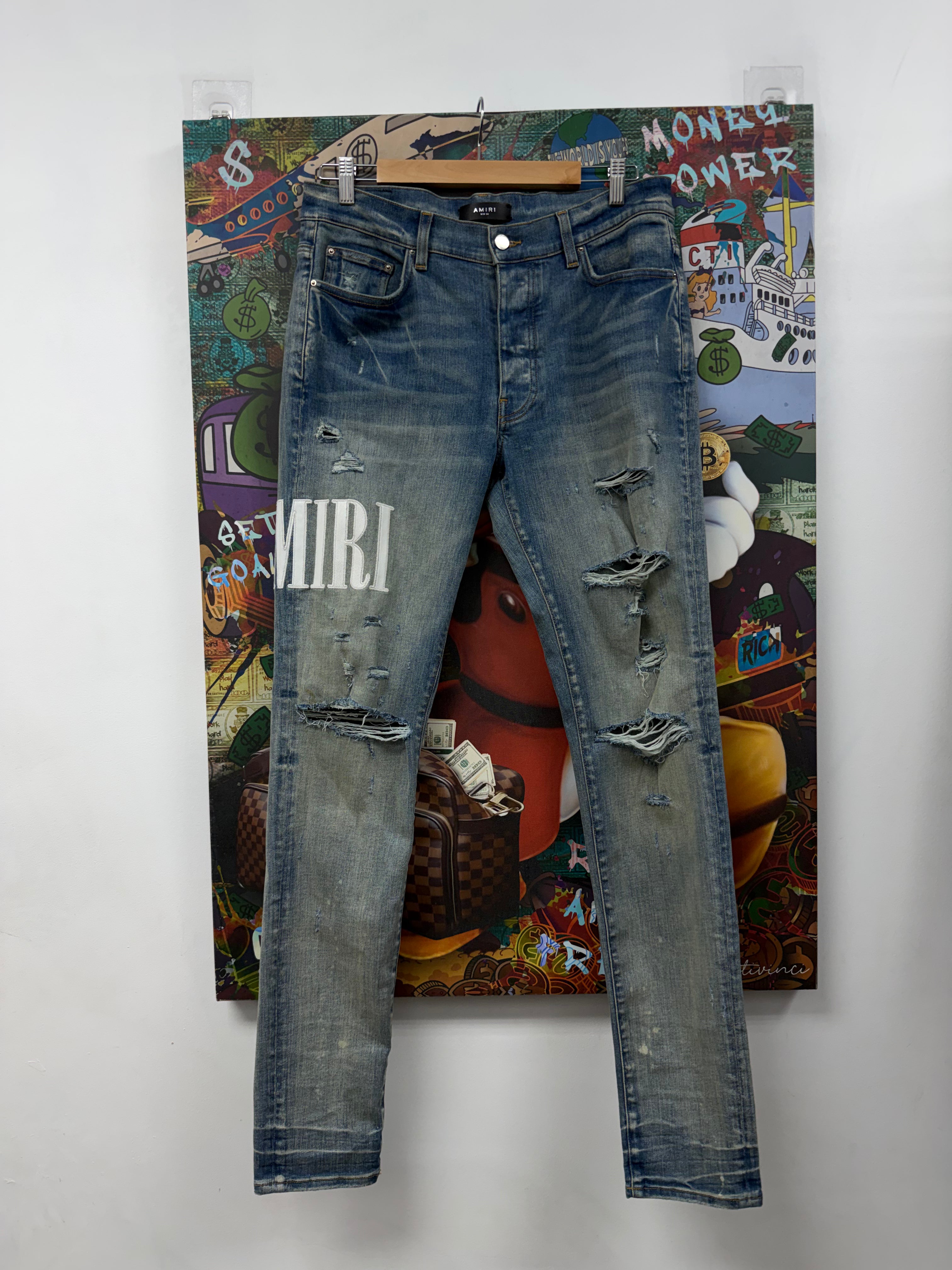Amiri Light Wash White Side Logo Jeans