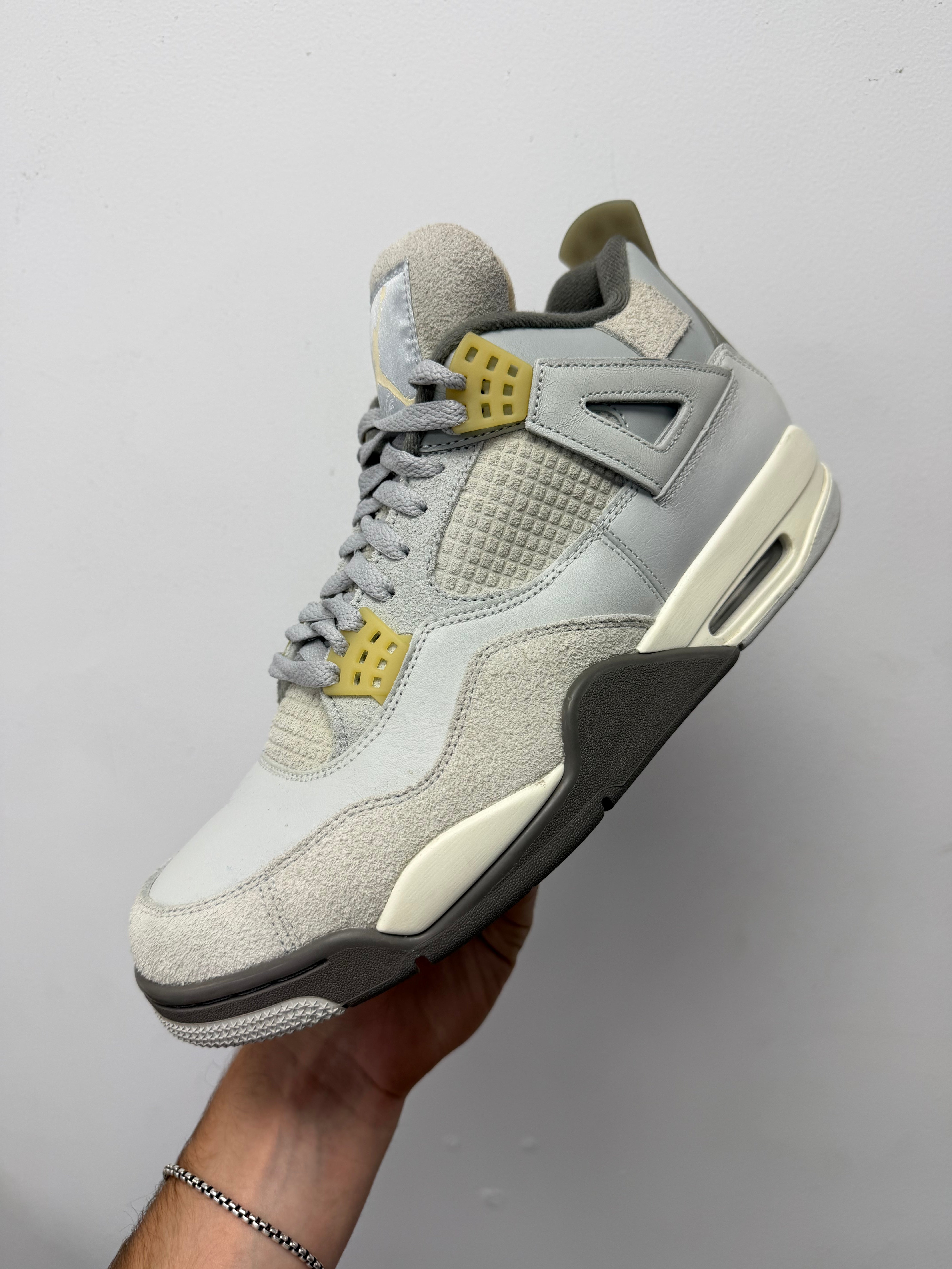 Jordan 4 Photon Dust Sneakers