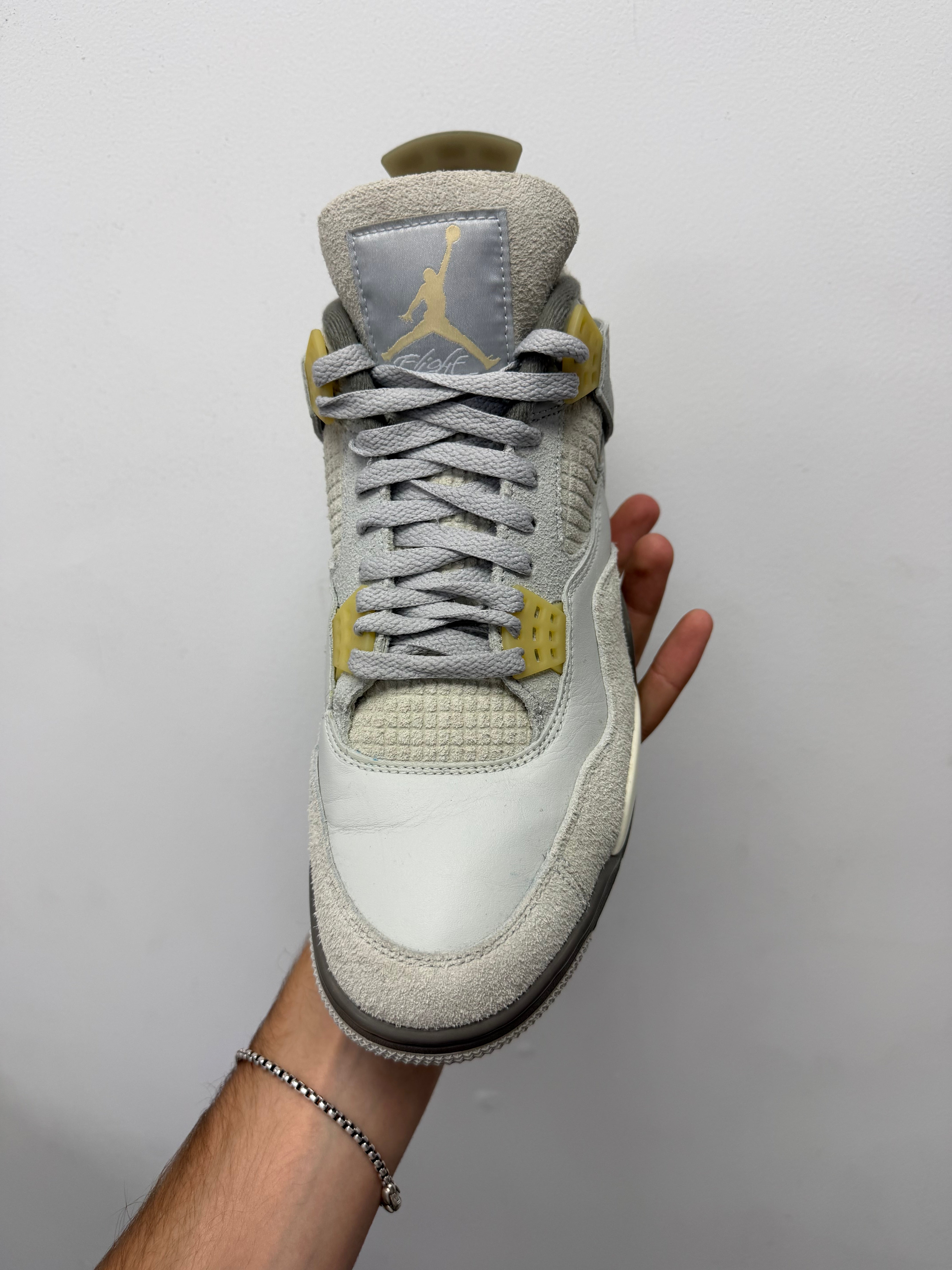 Jordan 4 Photon Dust Sneakers