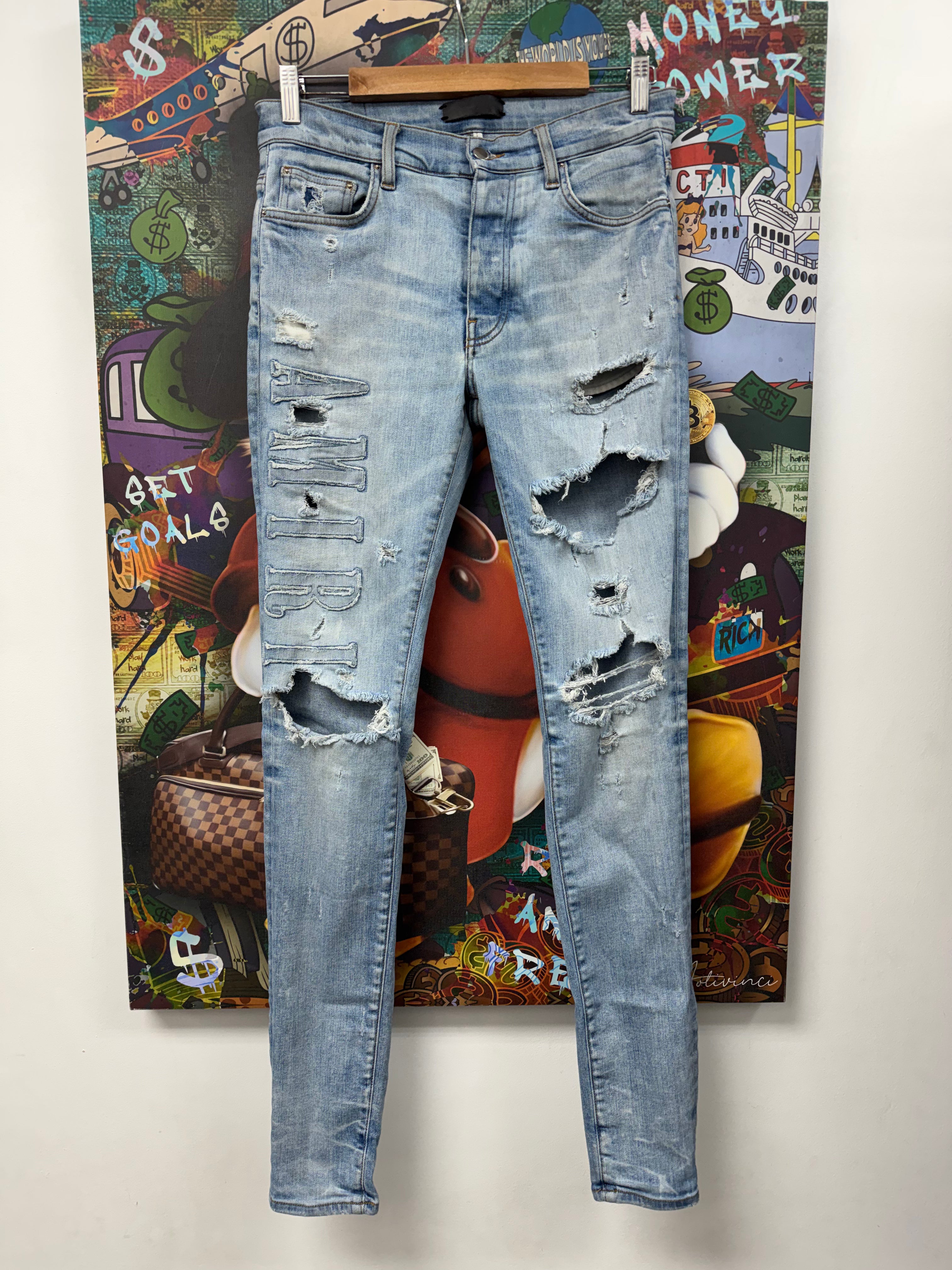 Amiri Light Wash Denim Applique Side Logo Jeans