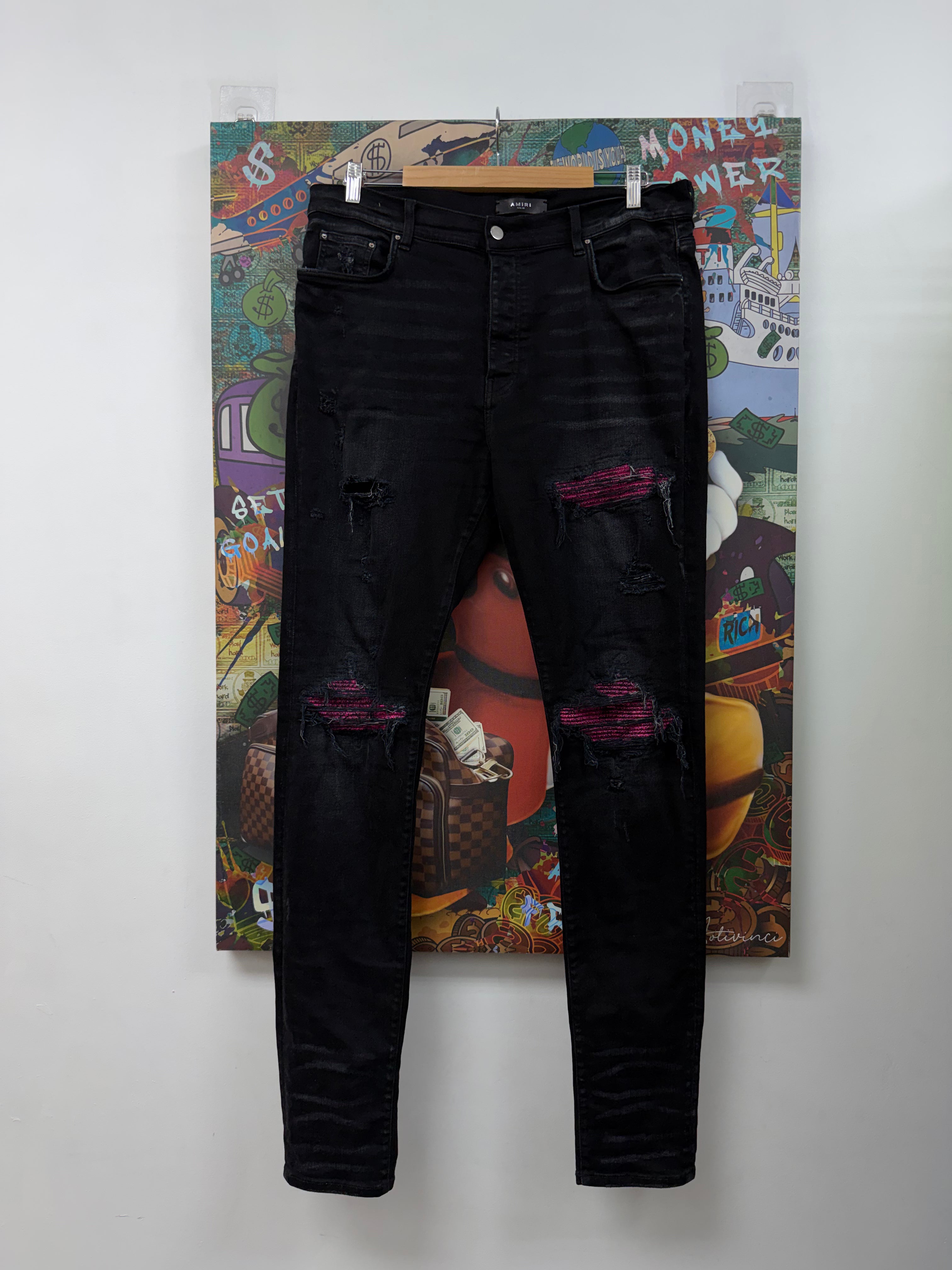 Amiri MX1 Black Wash Pink Crackle Patch Jeans