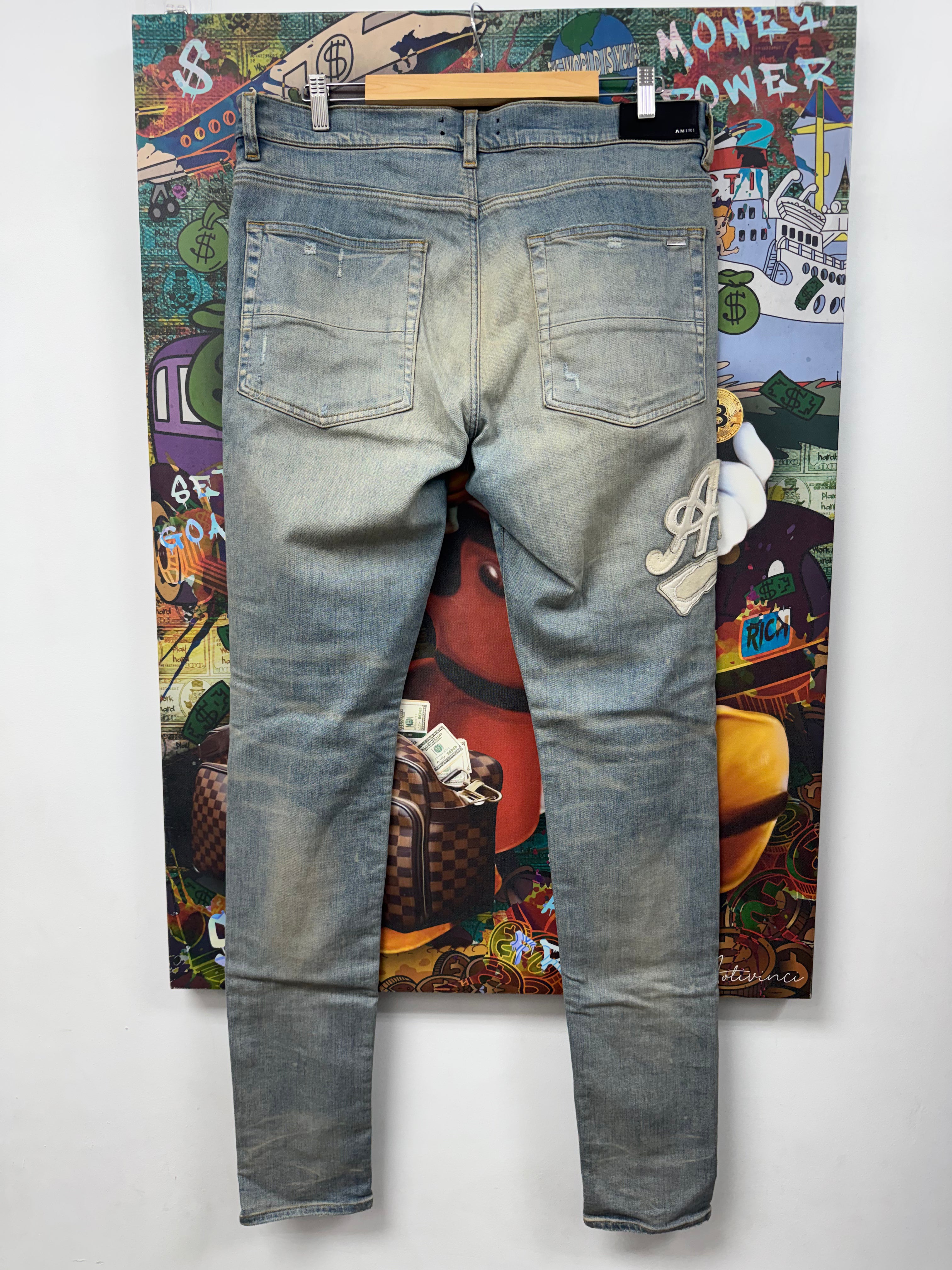 Amiri Light Indigo Cream 22 Patch Jeans