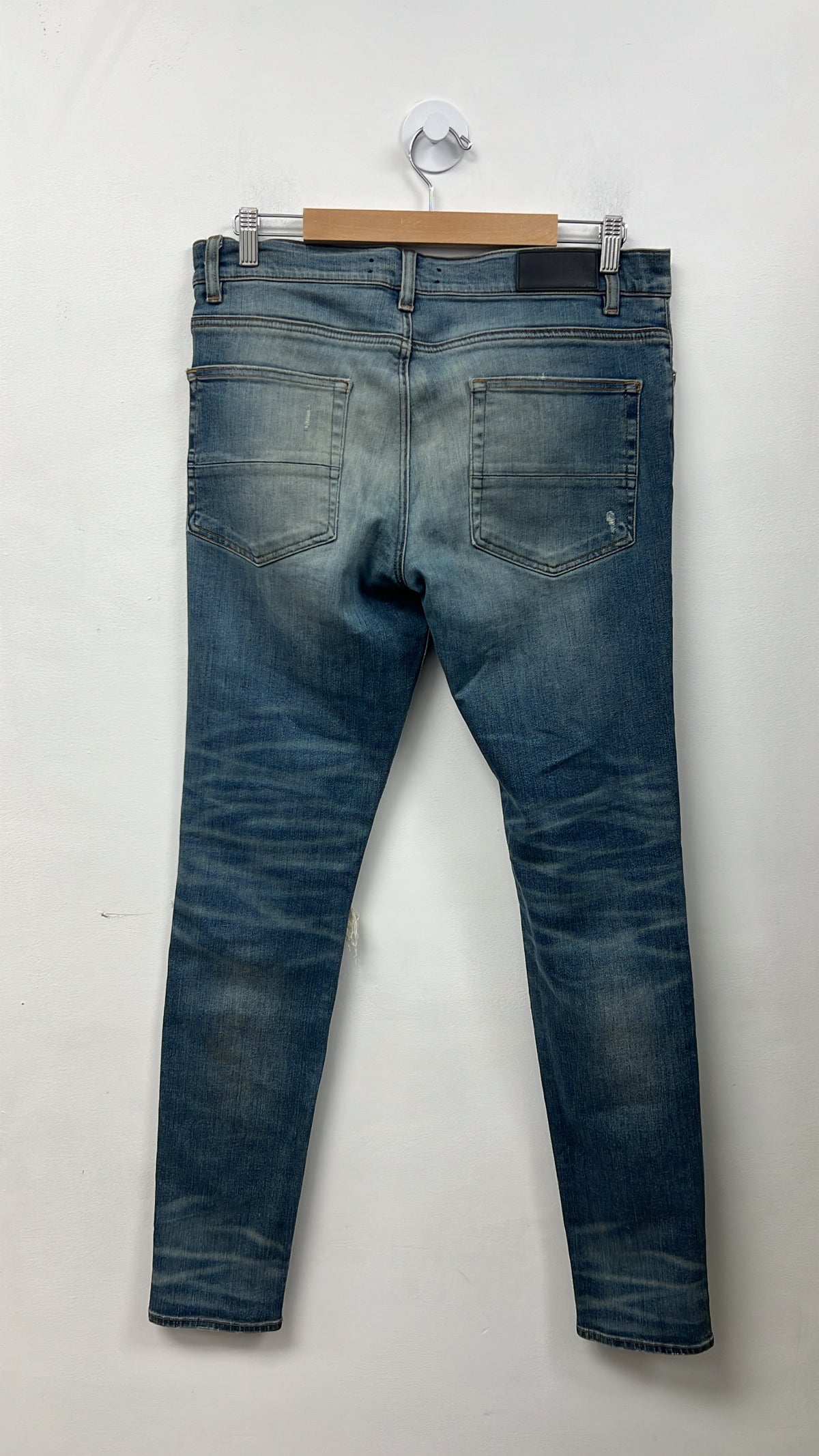 Amiri MX1 Light Wash Black Patch Zipper Jeans