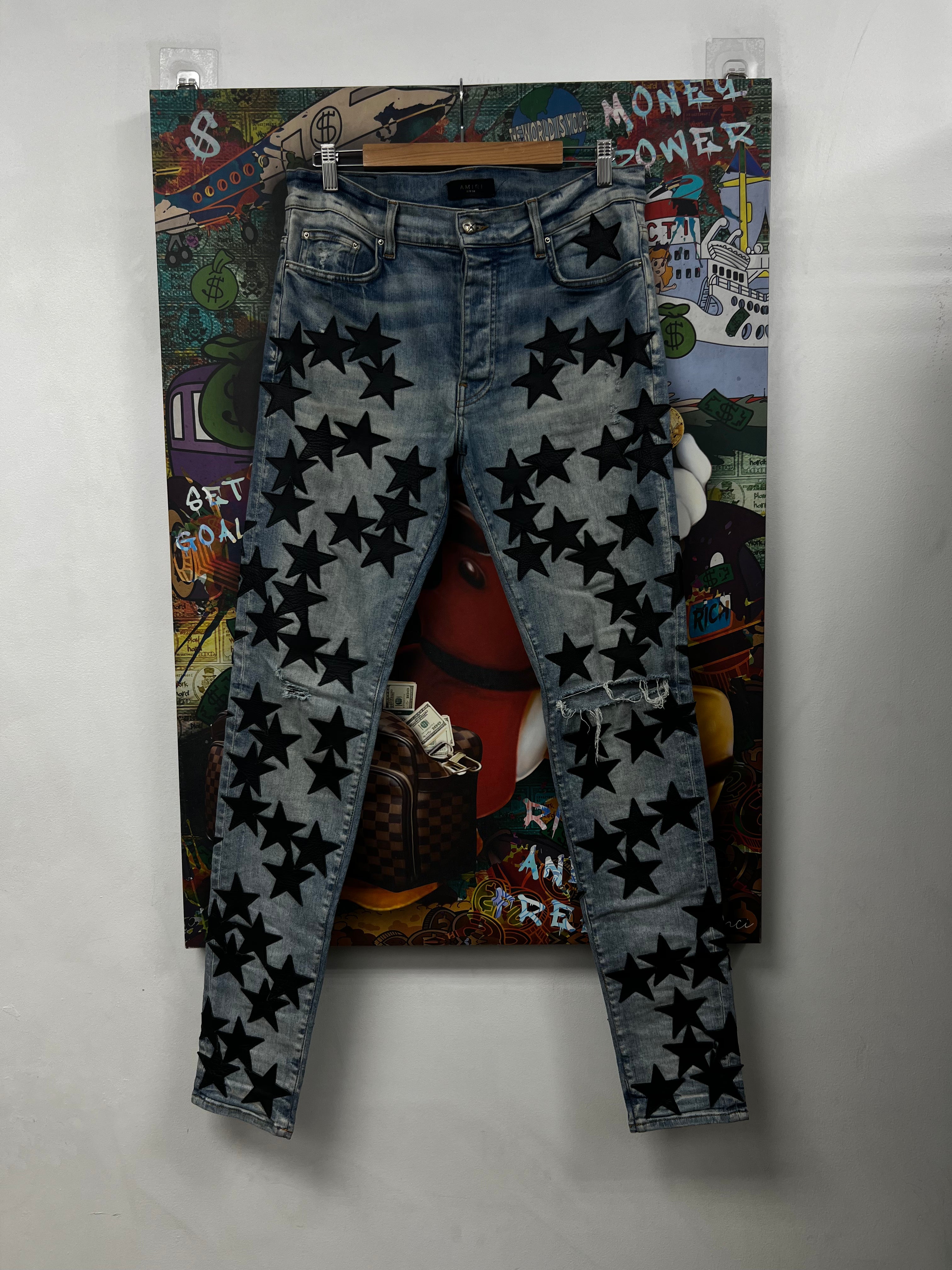 Amiri Light Wash Black Chemist Stars Jeans