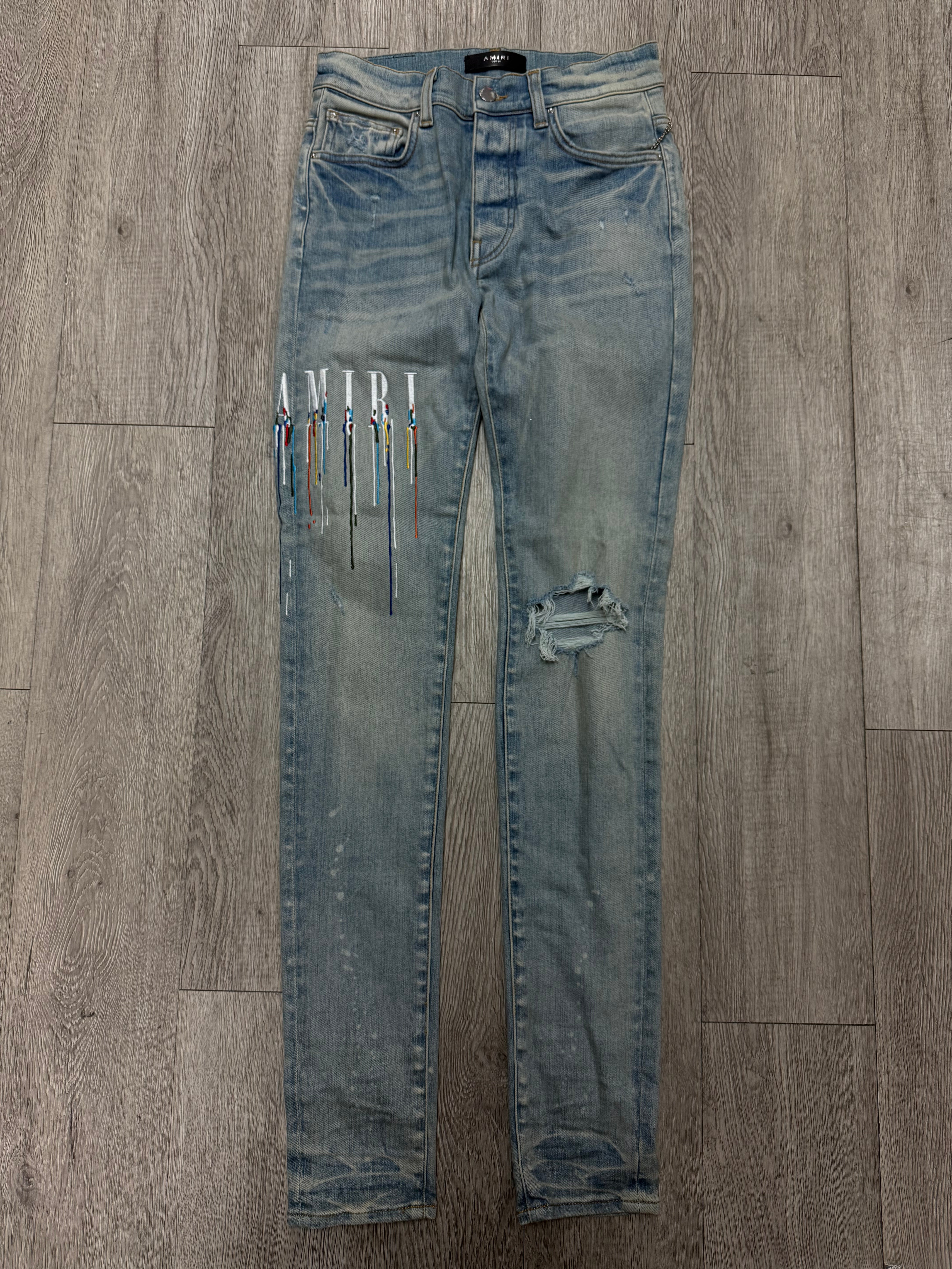 Amiri Light Wash Paint Drip Jeans