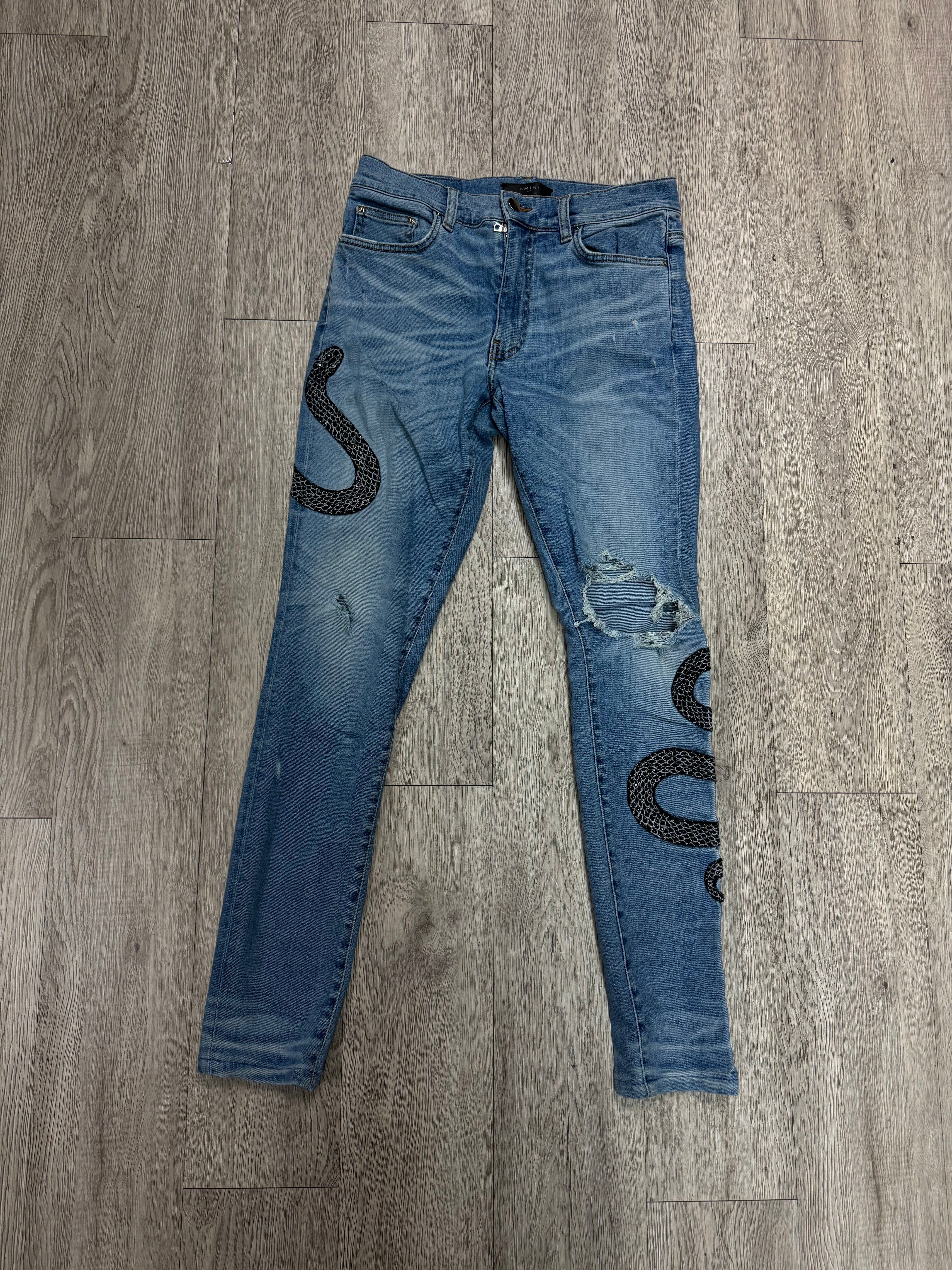 Amiri Light Wash Crystal Snake Jeans