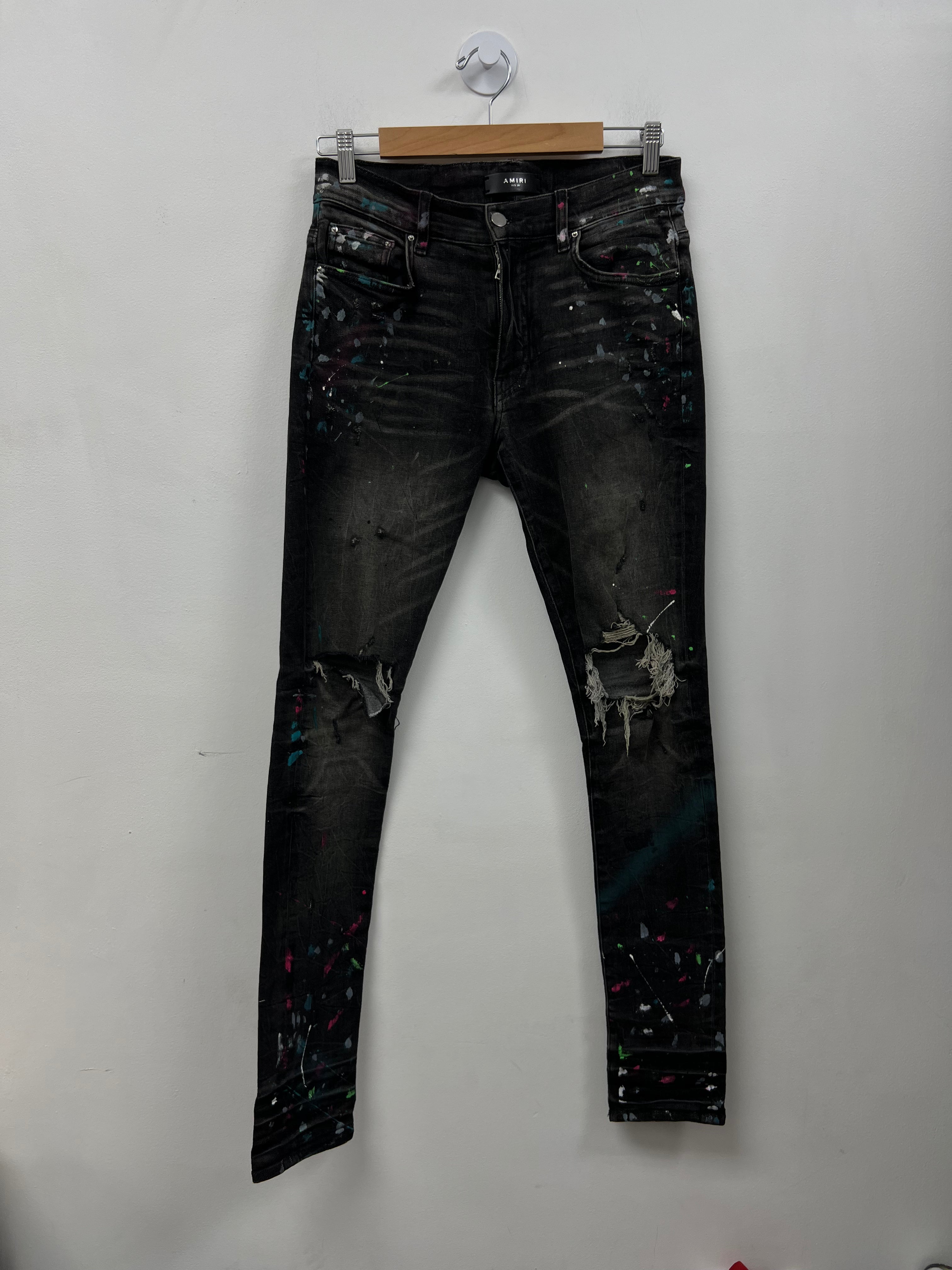 Amiri Black Wash South Bleach Splatter Ripped Thrasher Jeans