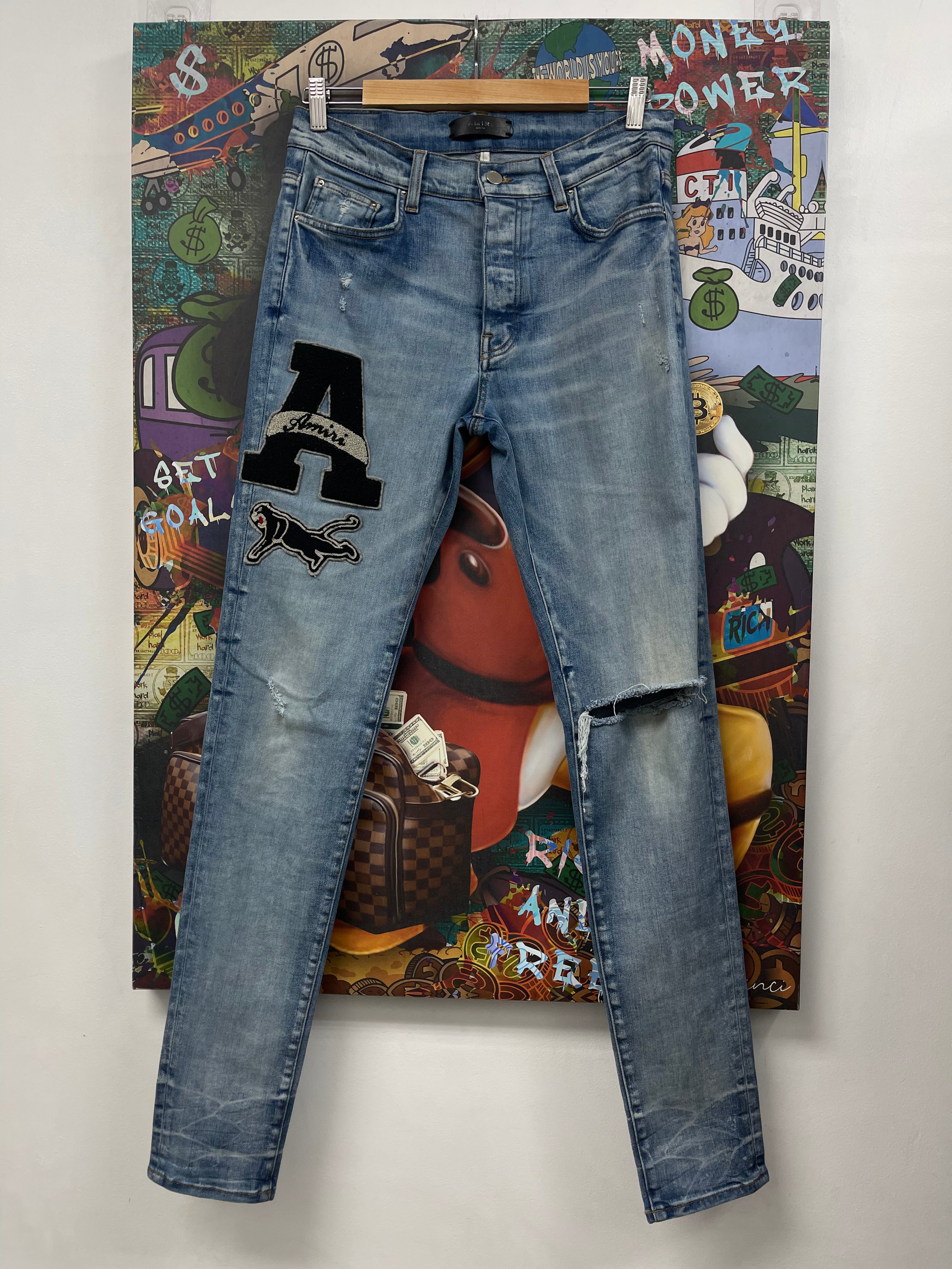 Amiri Light Wash A Varsity Patch Jeans