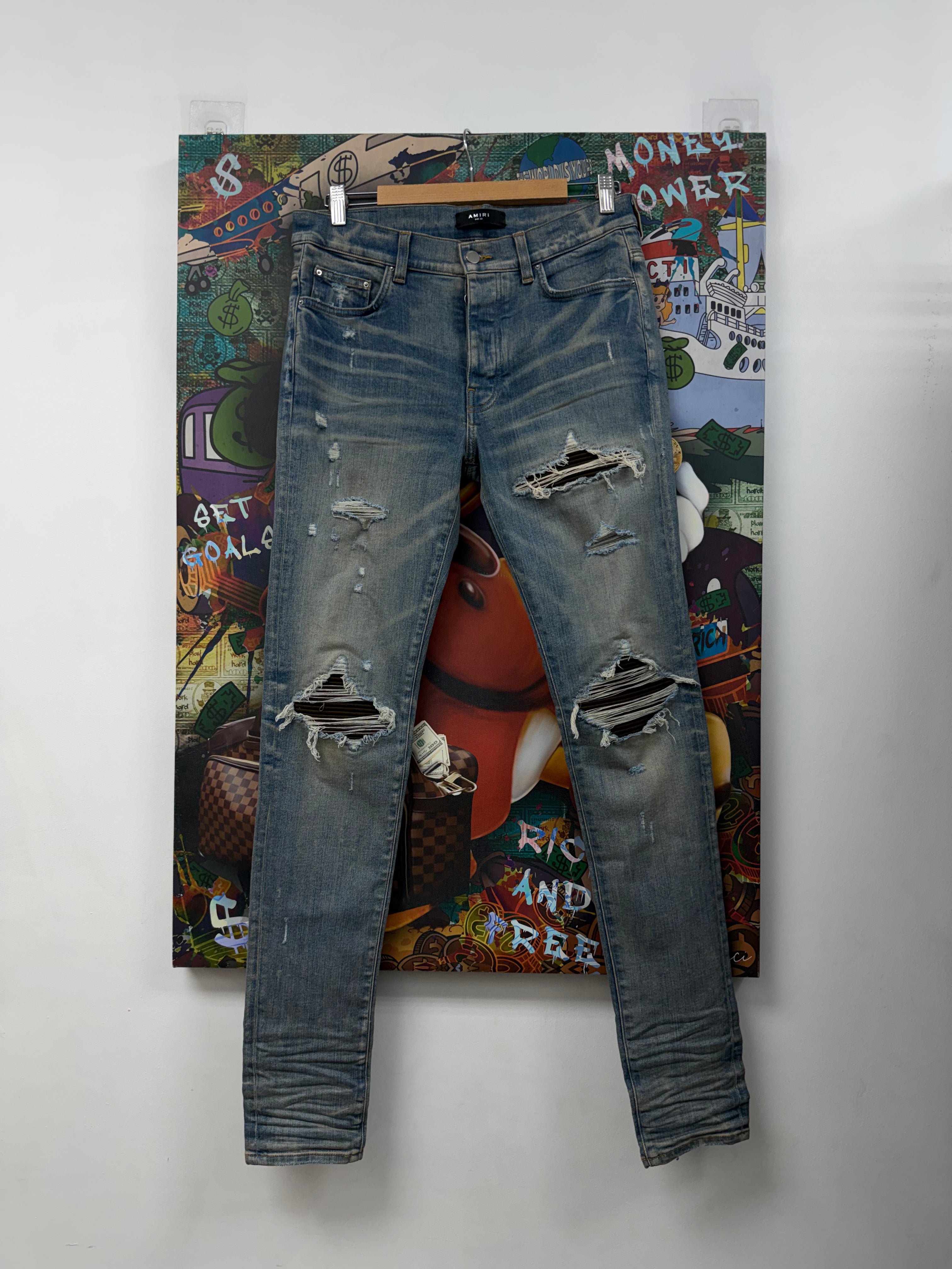 Amiri MX1 Light Wash Brown Patch Jeans