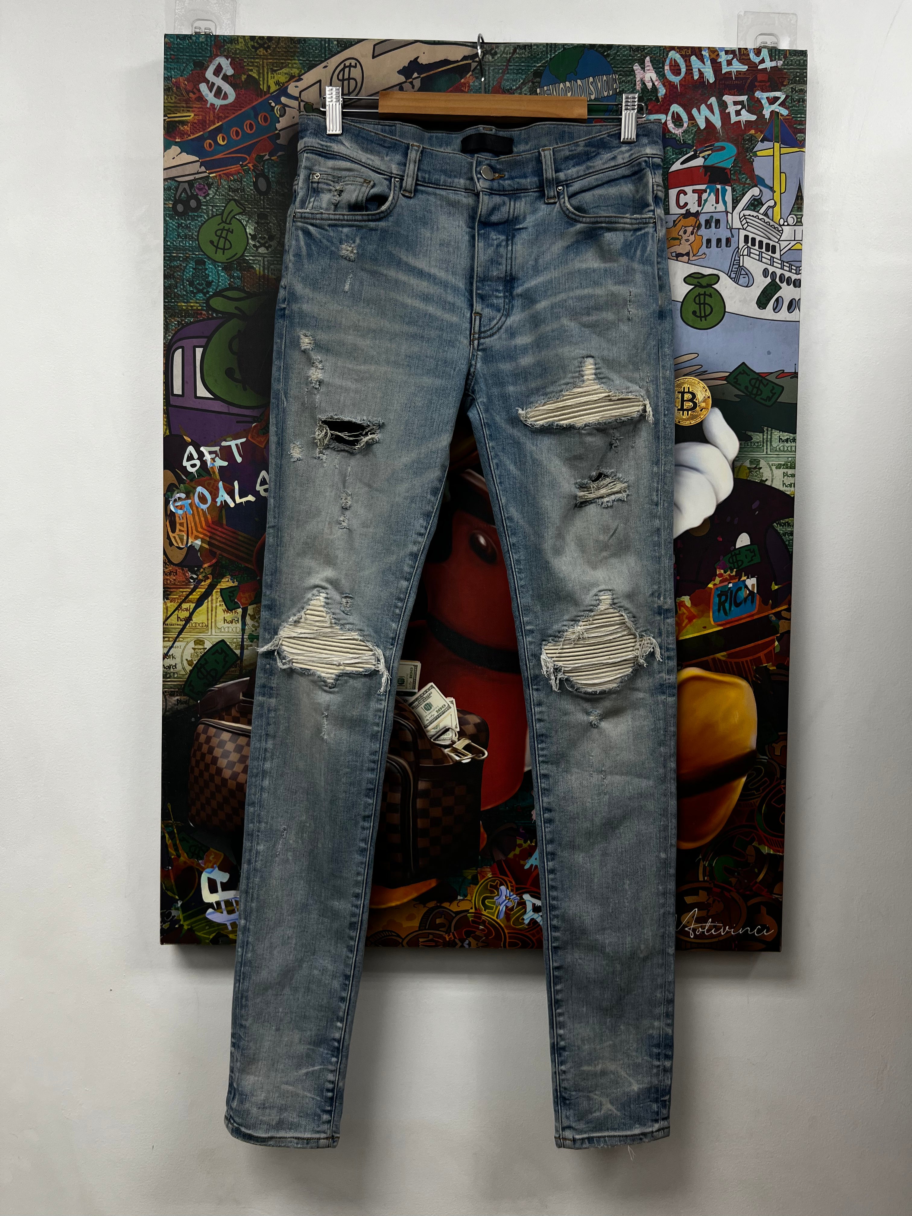Amiri MX1 Light Wash White Suede Patch Jeans
