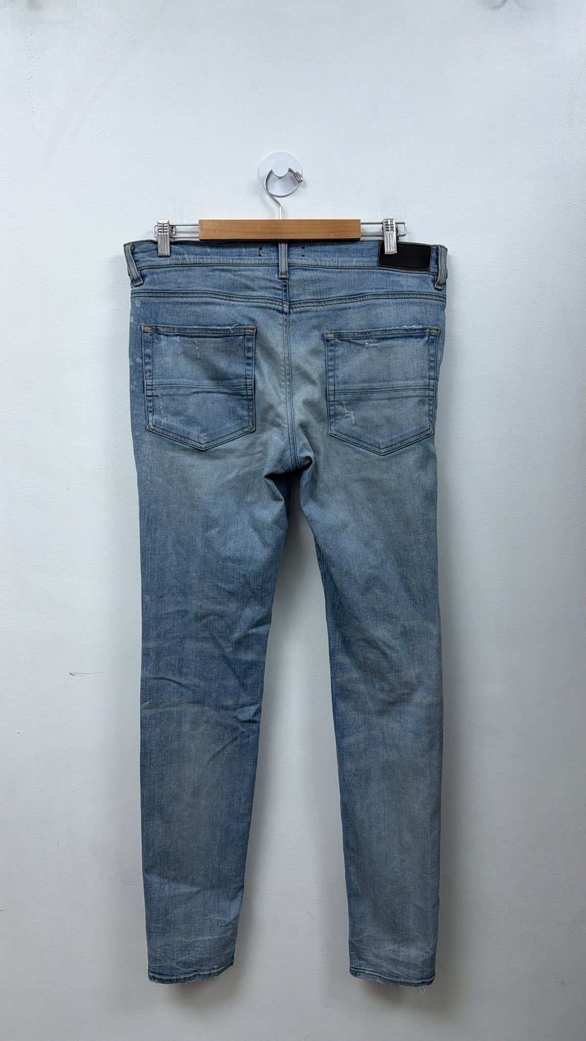 Amiri MX1 Light Wash White Leather Patch Jeans