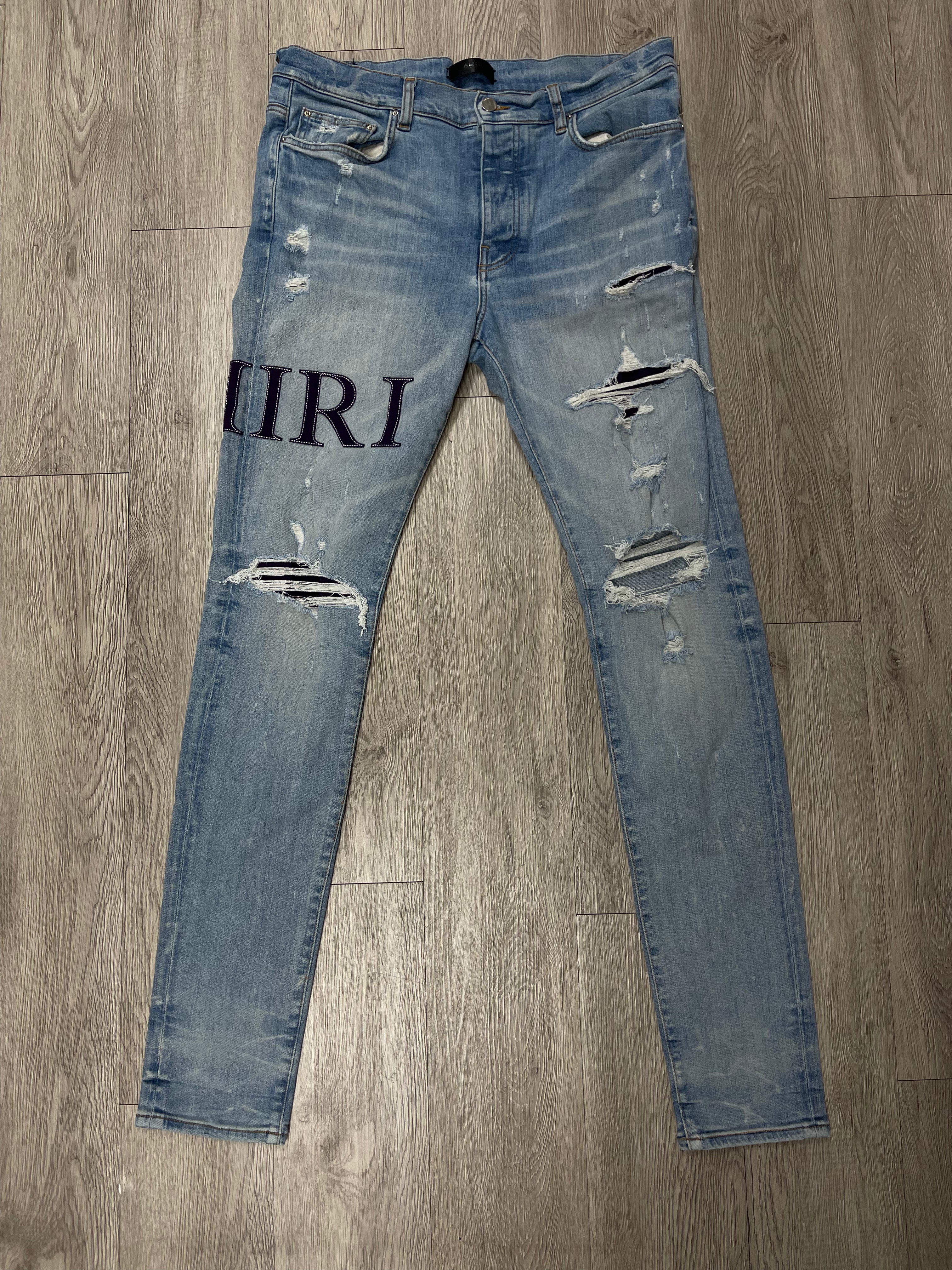 Amiri Light Wash Purple Serif Side Logo Jeans