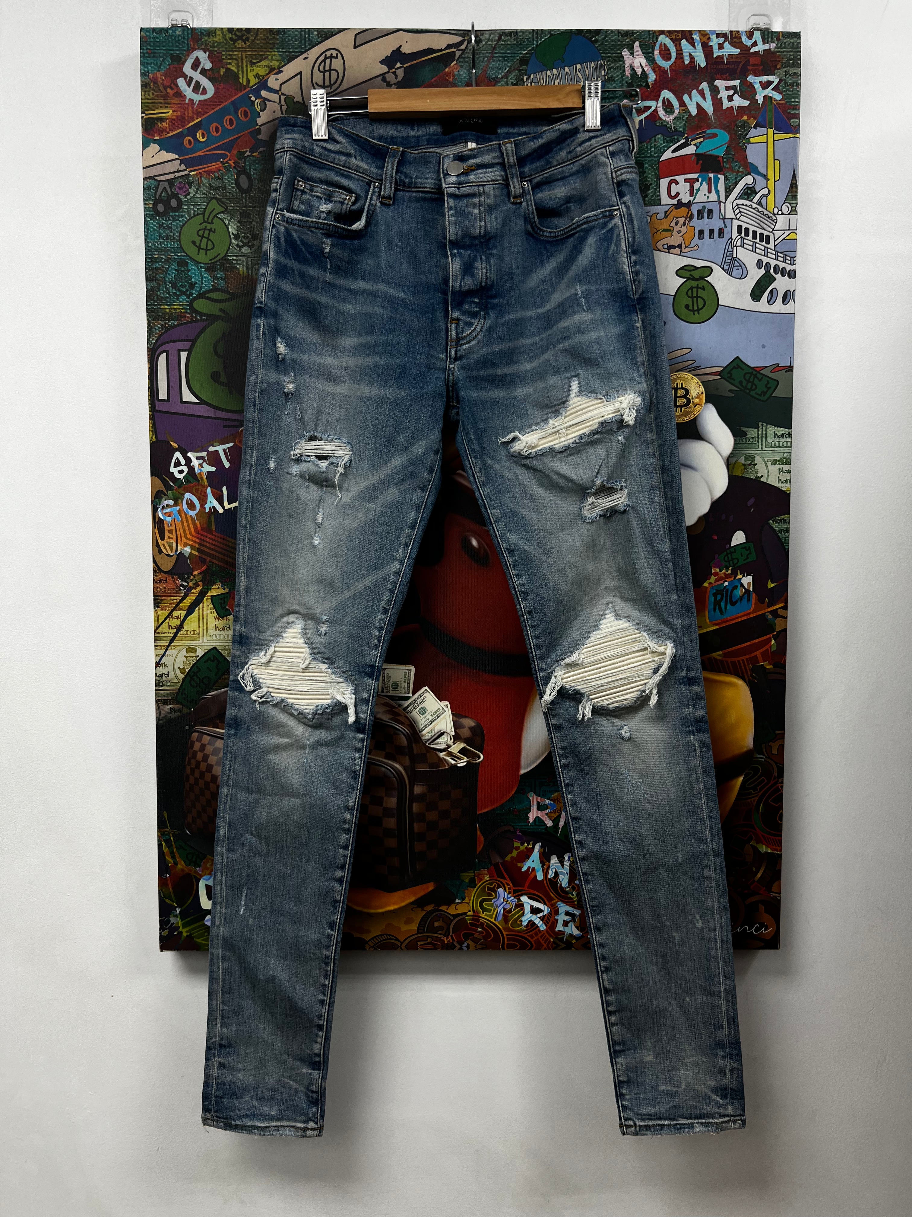 Amiri MX1 Light Wash White Suede Patch Jeans