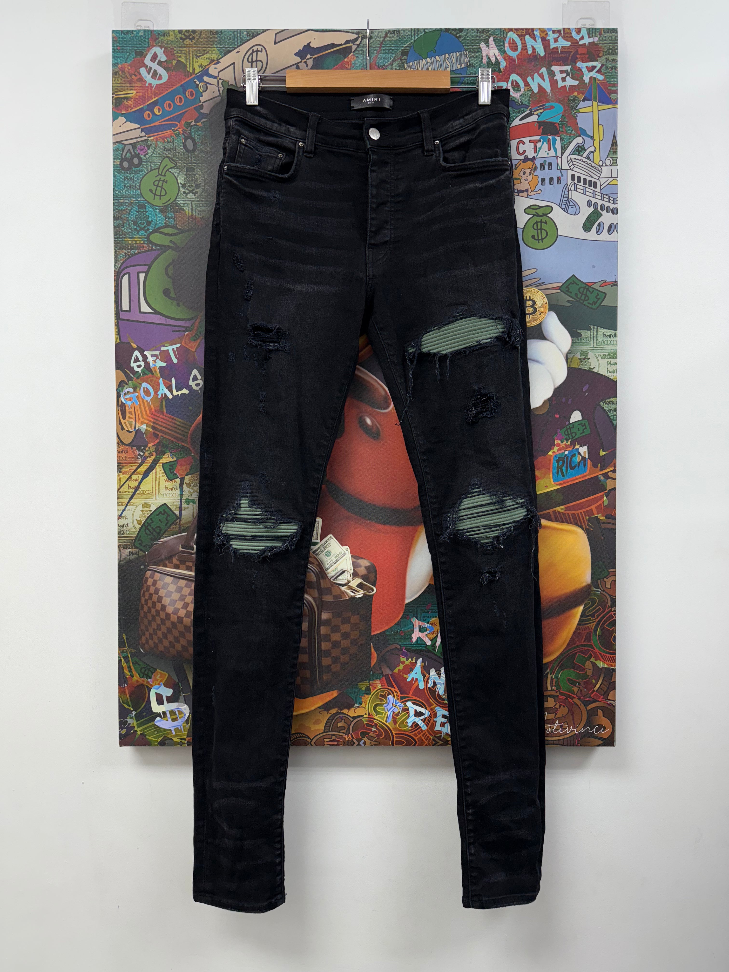 Amiri MX1 Black Wash Olive Suede Patch Jeans
