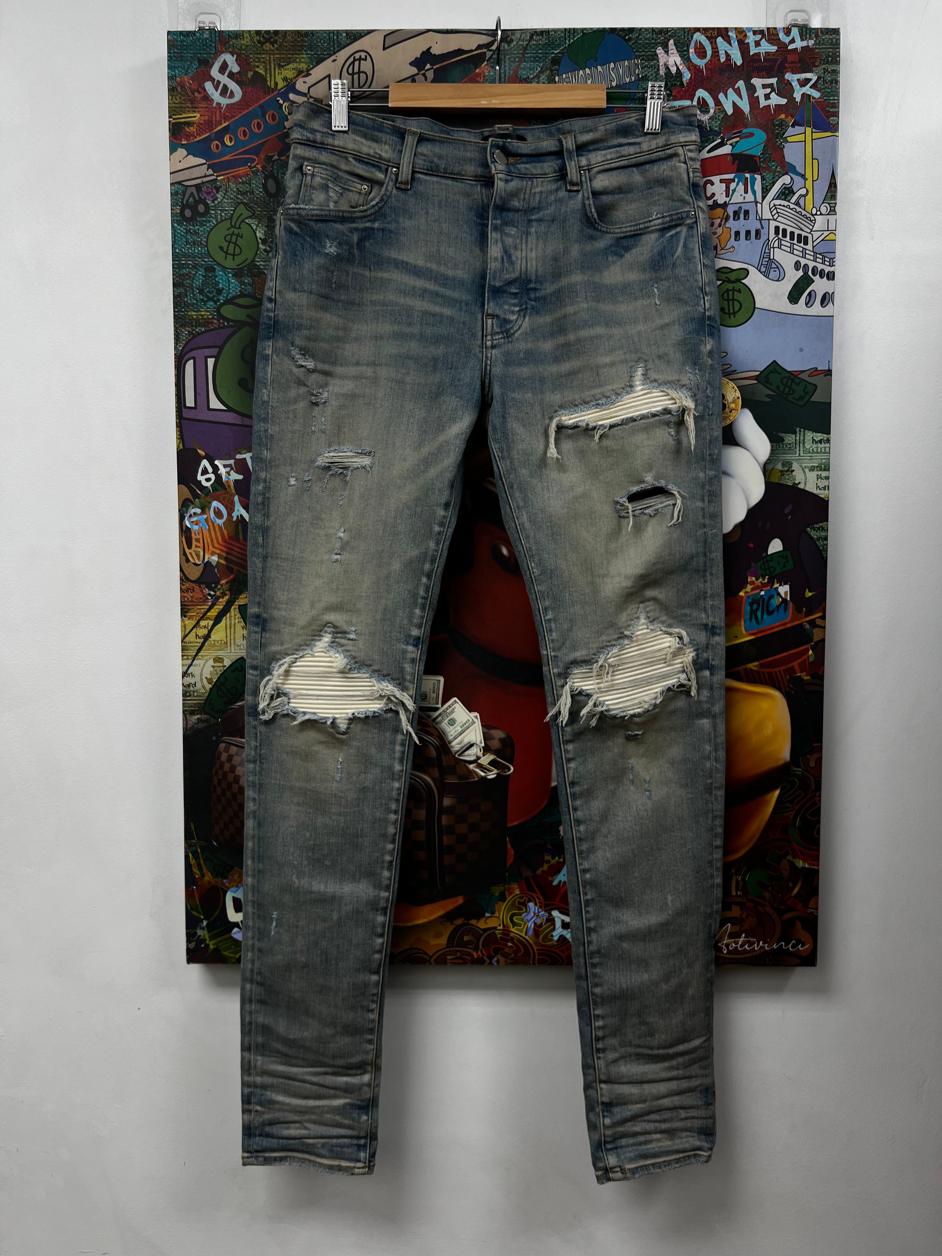 Amiri MX1 Light Wash White Suede Patch Jeans