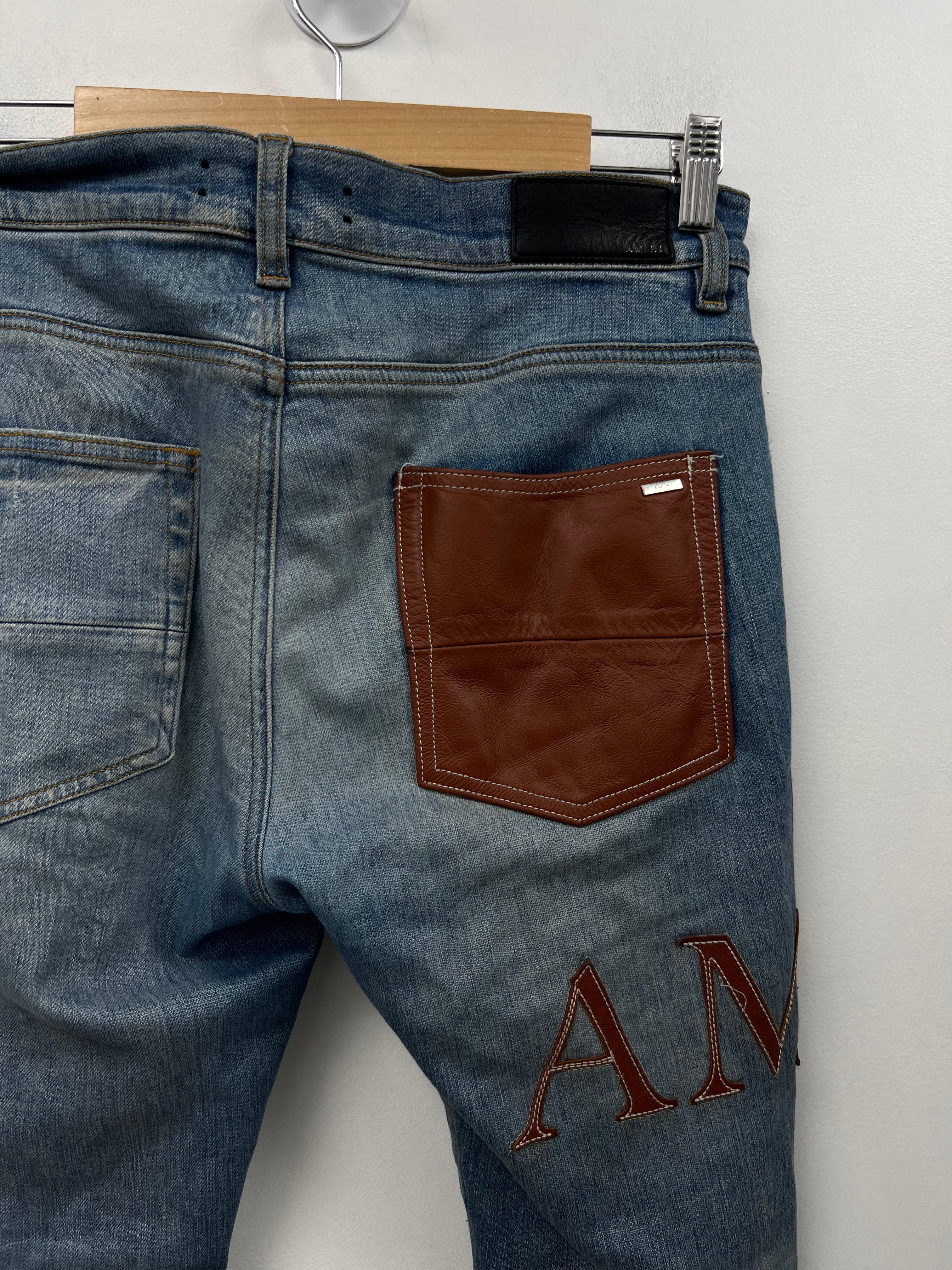 Amiri Light Wash Clay Side Logo Jeans