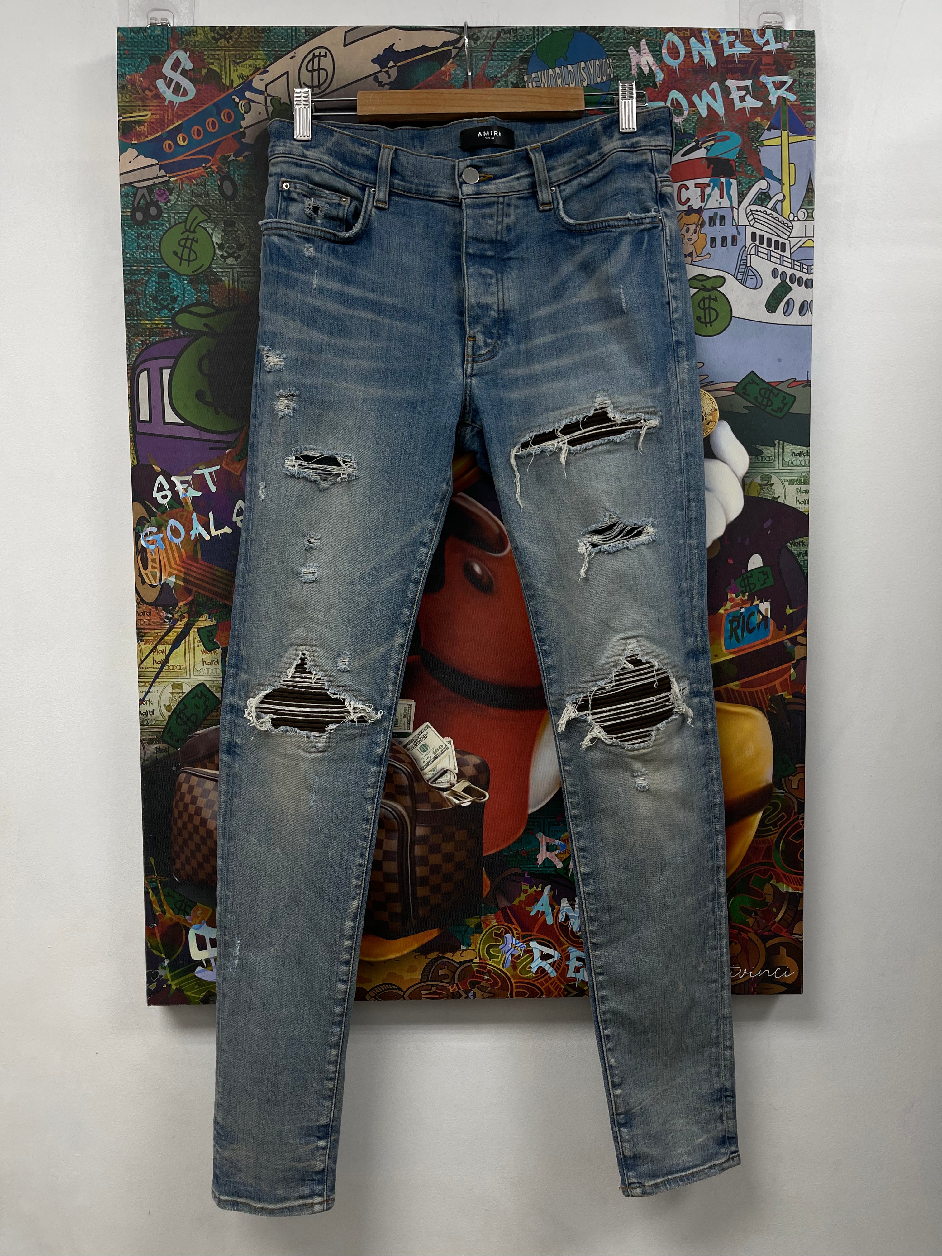 Amiri MX1 Light Wash Brown Suede Patch Jeans