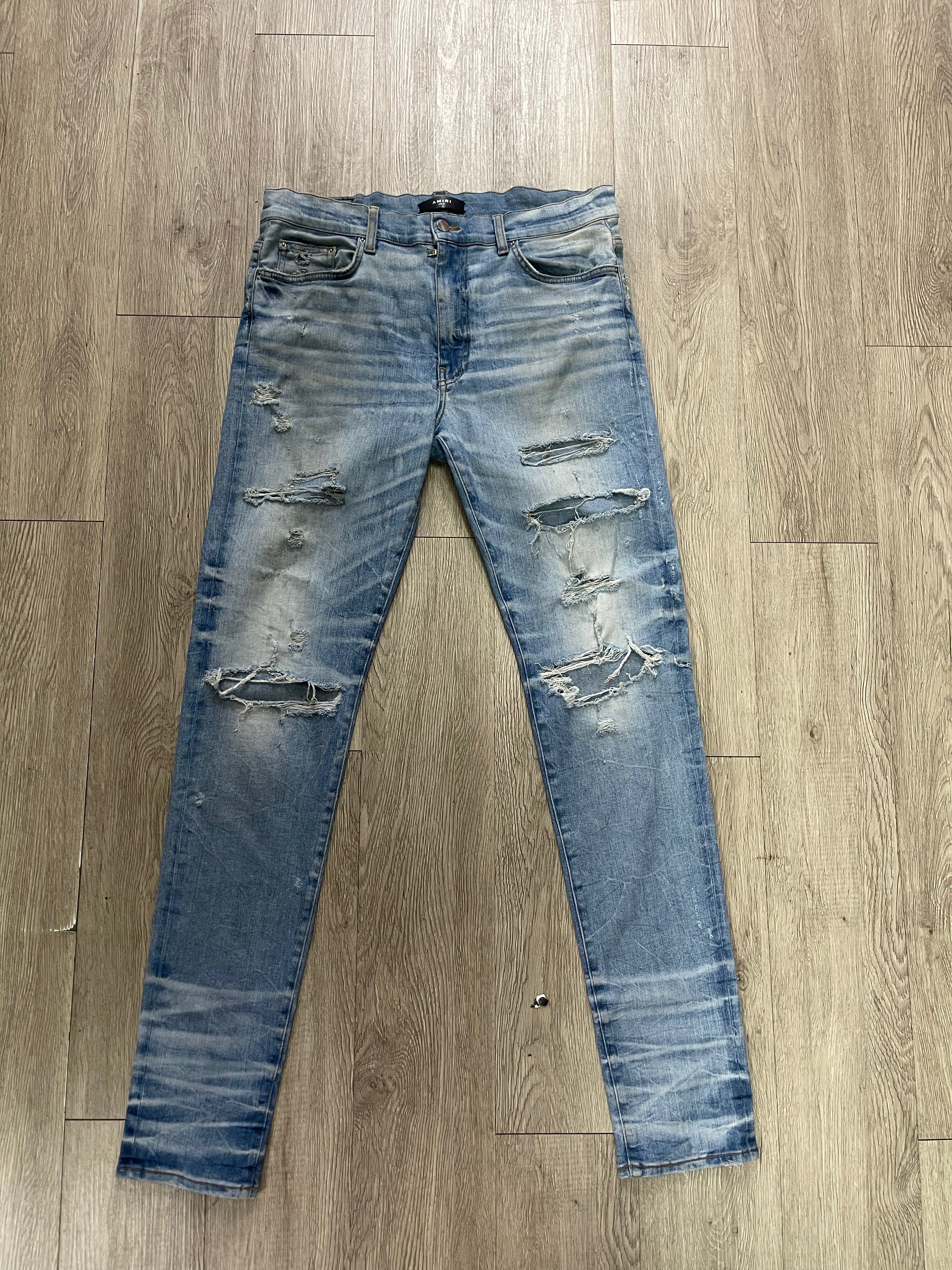 Amiri Light Wash Ripped (Old Season) Jeans