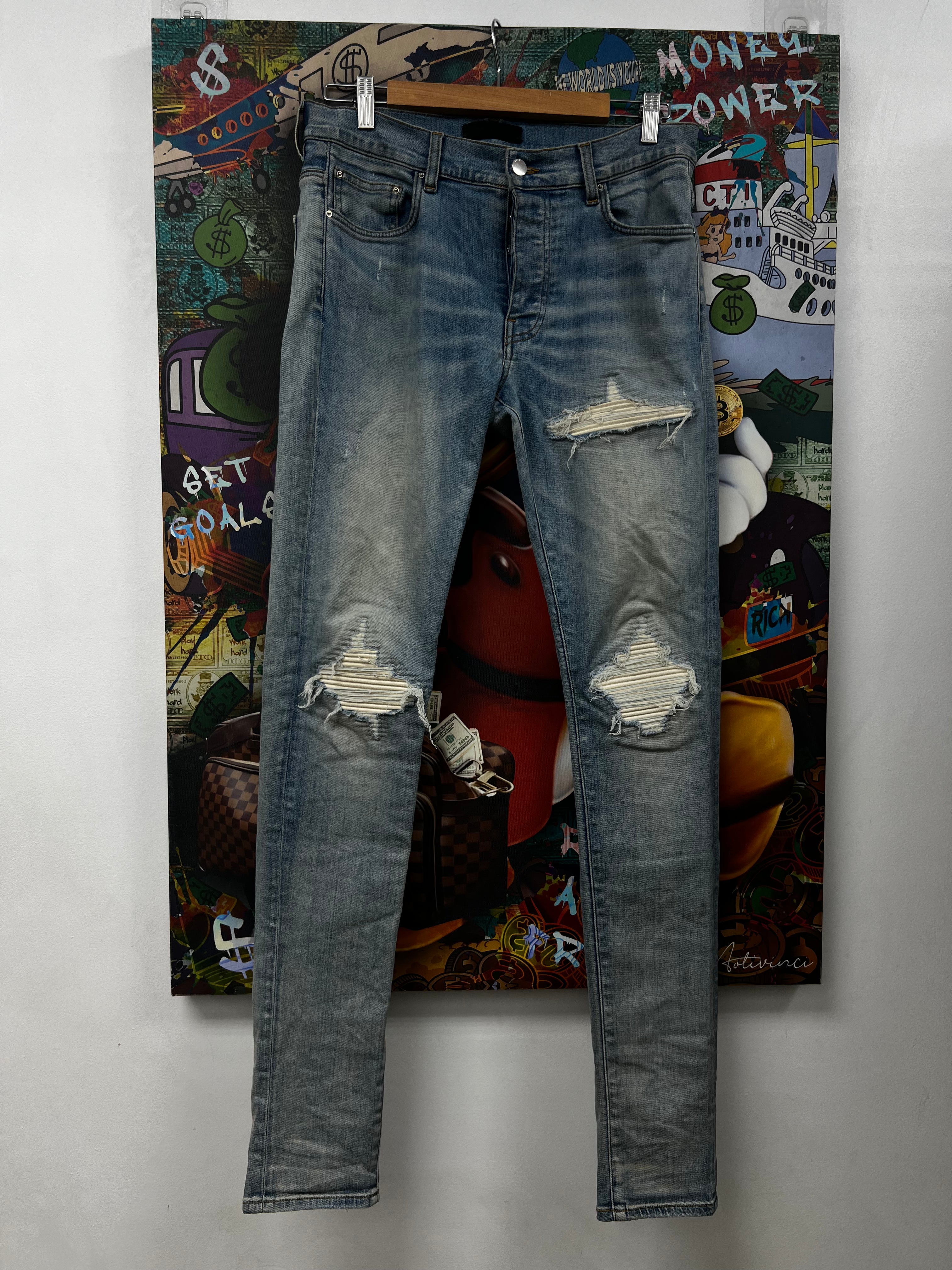 Amiri MX1 Light Wash White Patch Jeans