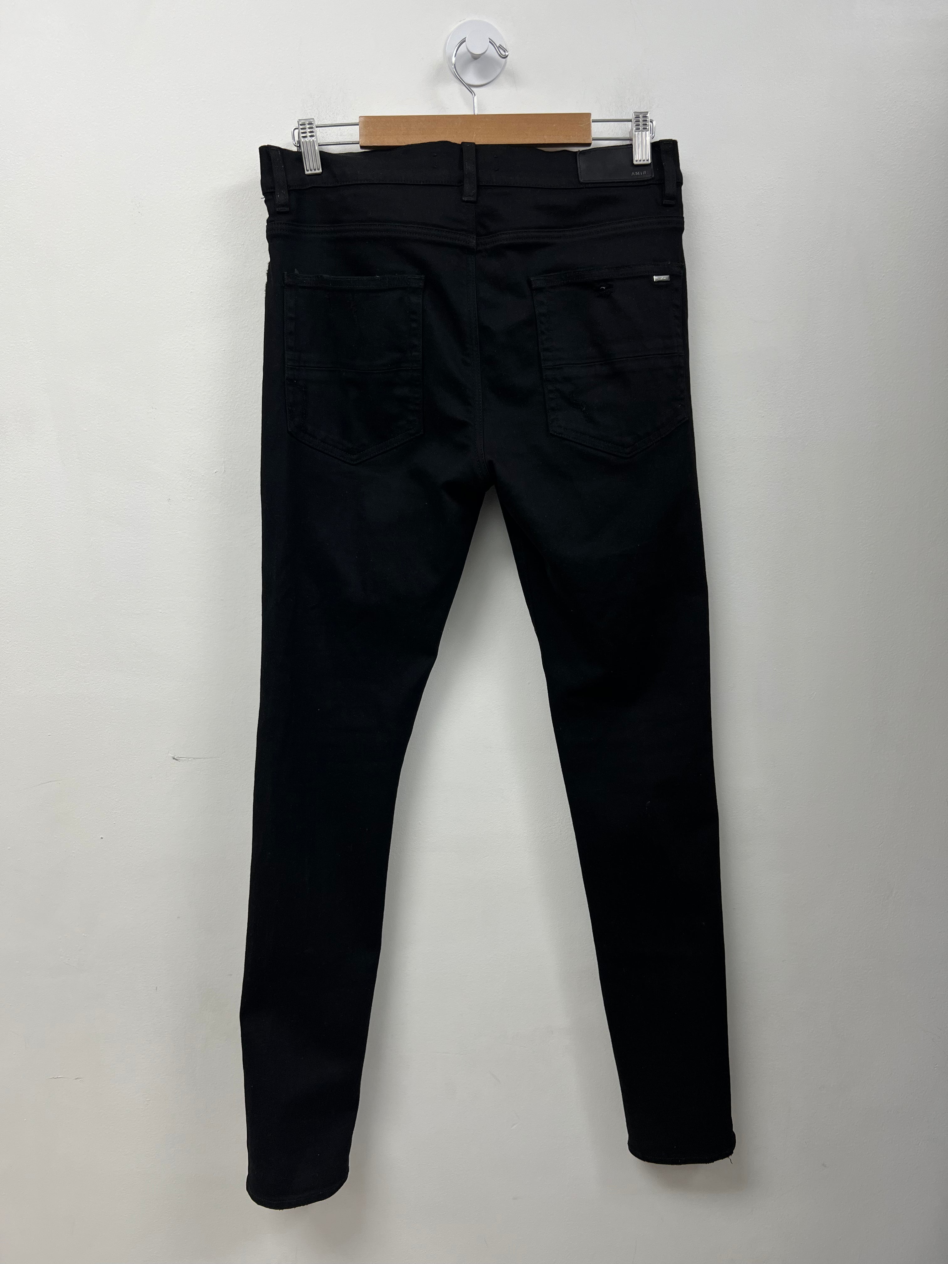 Amiri MX1 Black Leather Patch Jeans