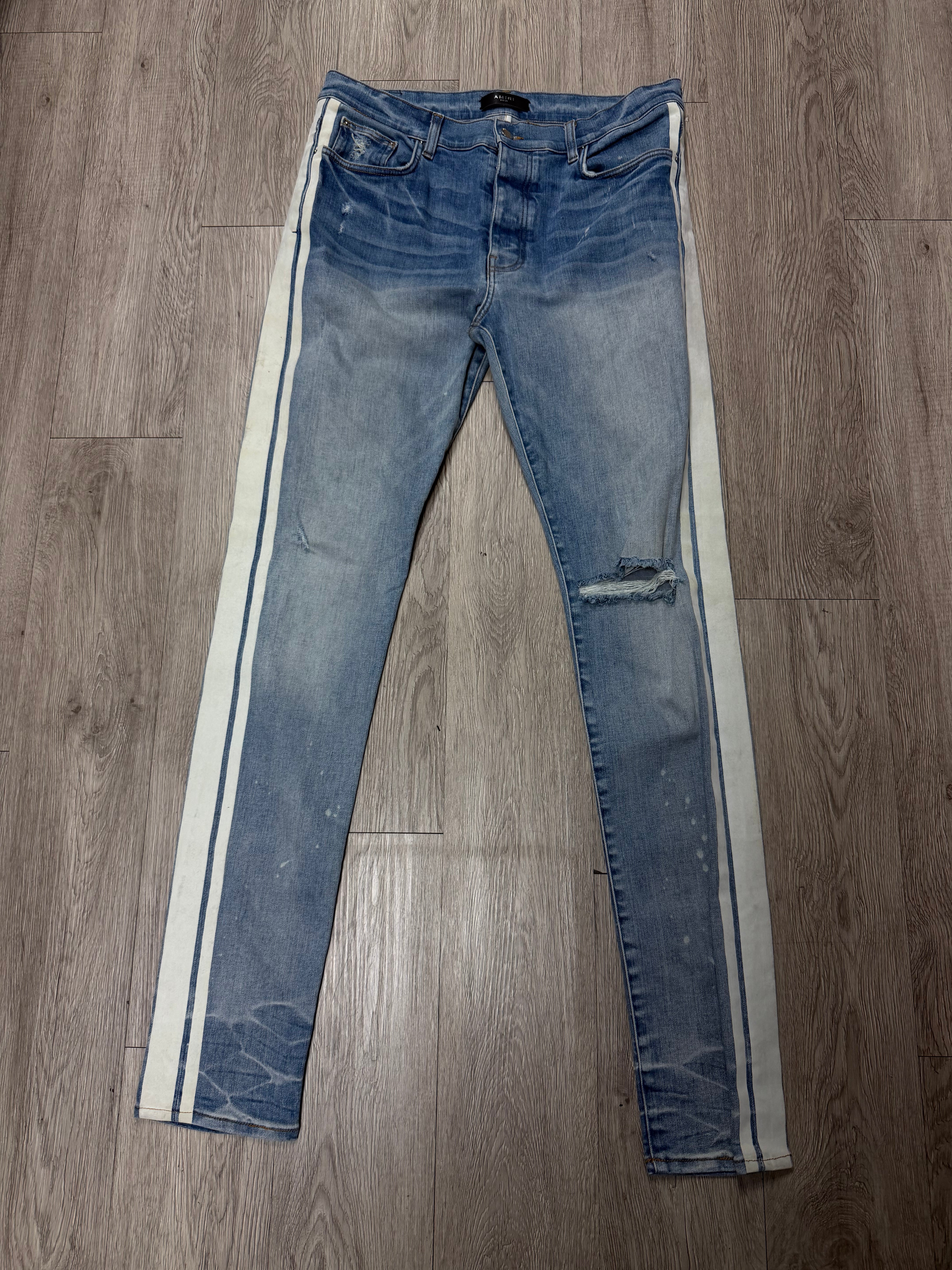 Amiri Light Wash White Stripe Jeans