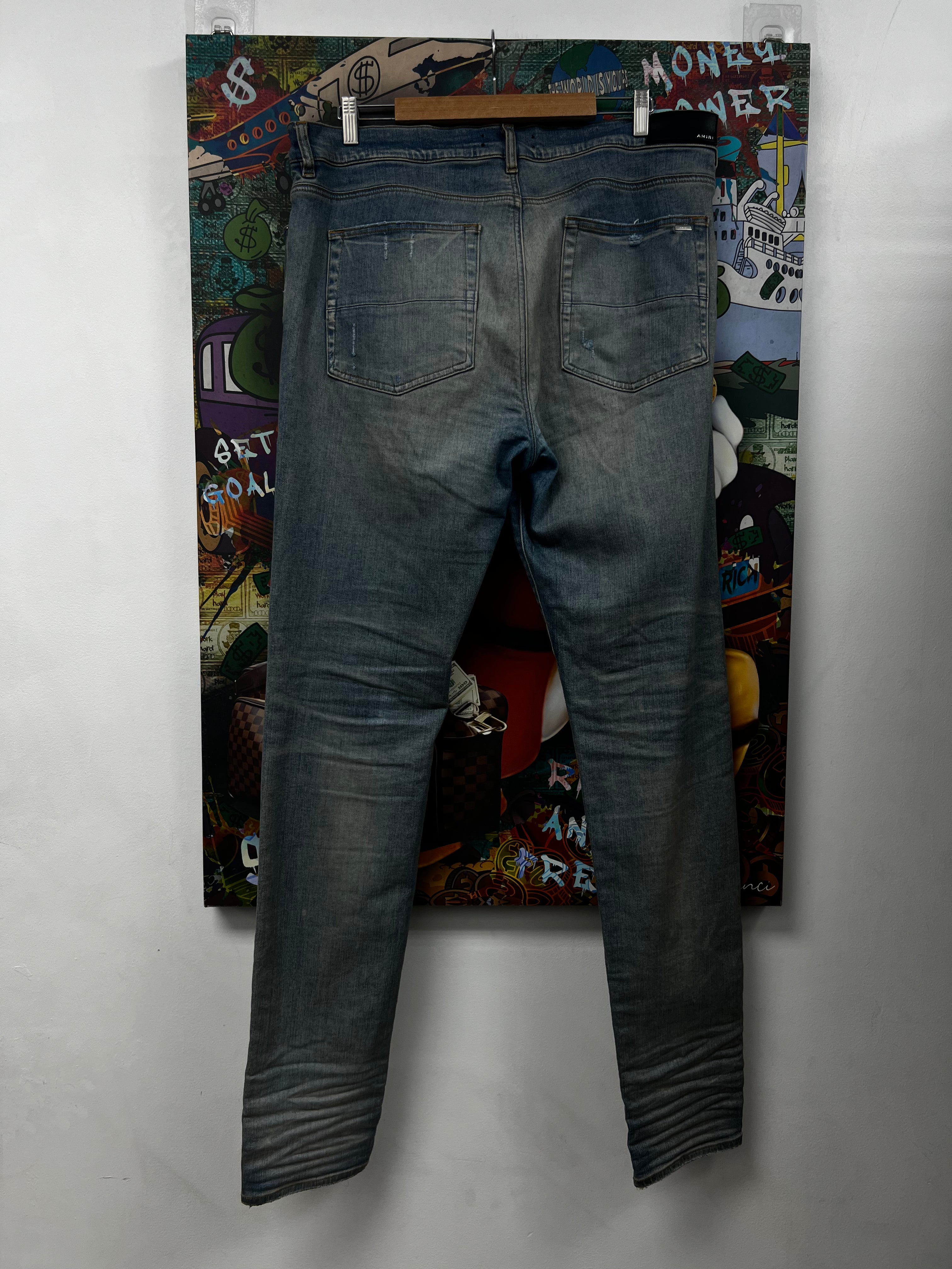 Amiri MX1 Light Wash Pink Patch Jeans