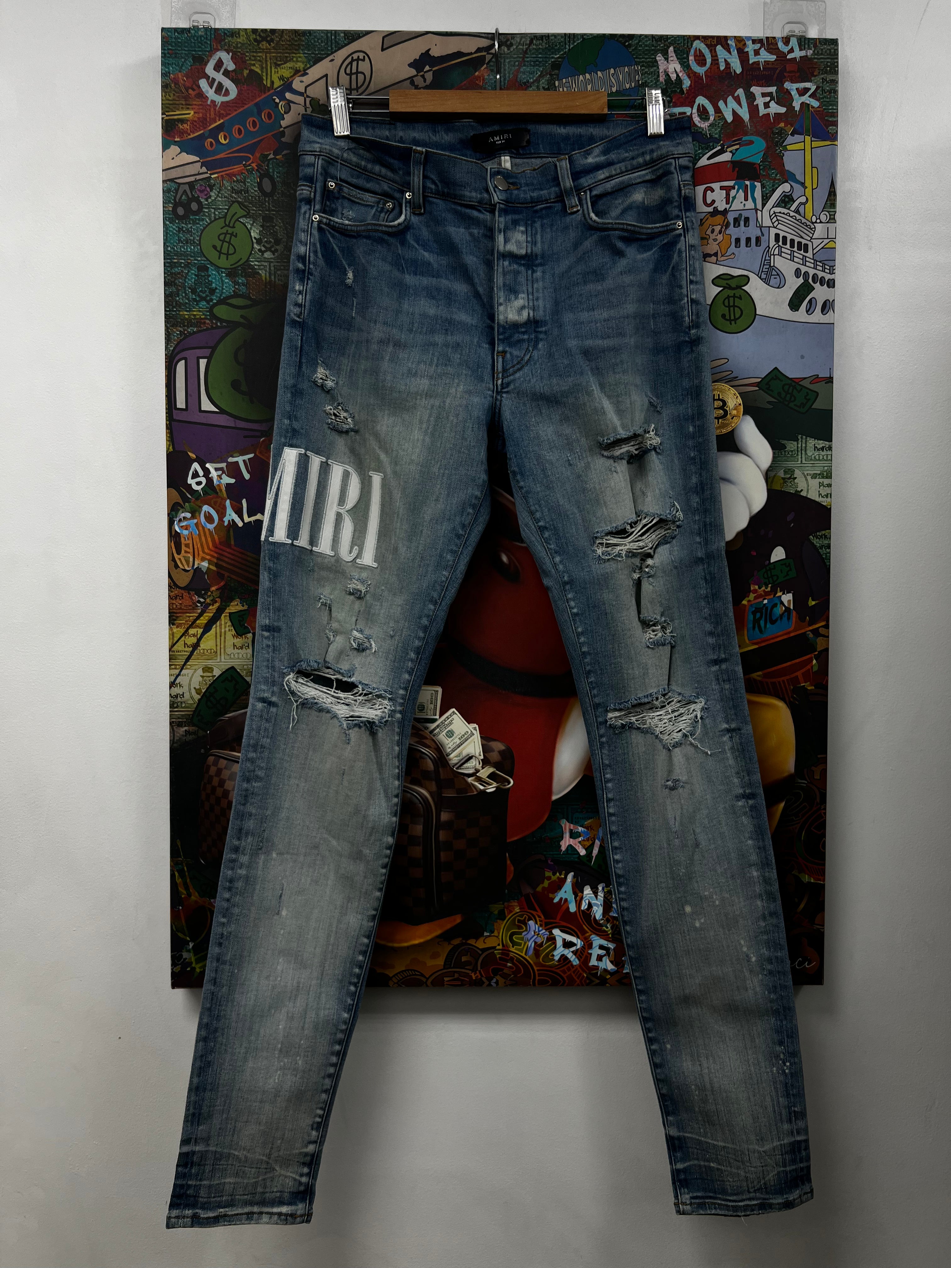 Amiri Light Wash White Side Logo Jeans