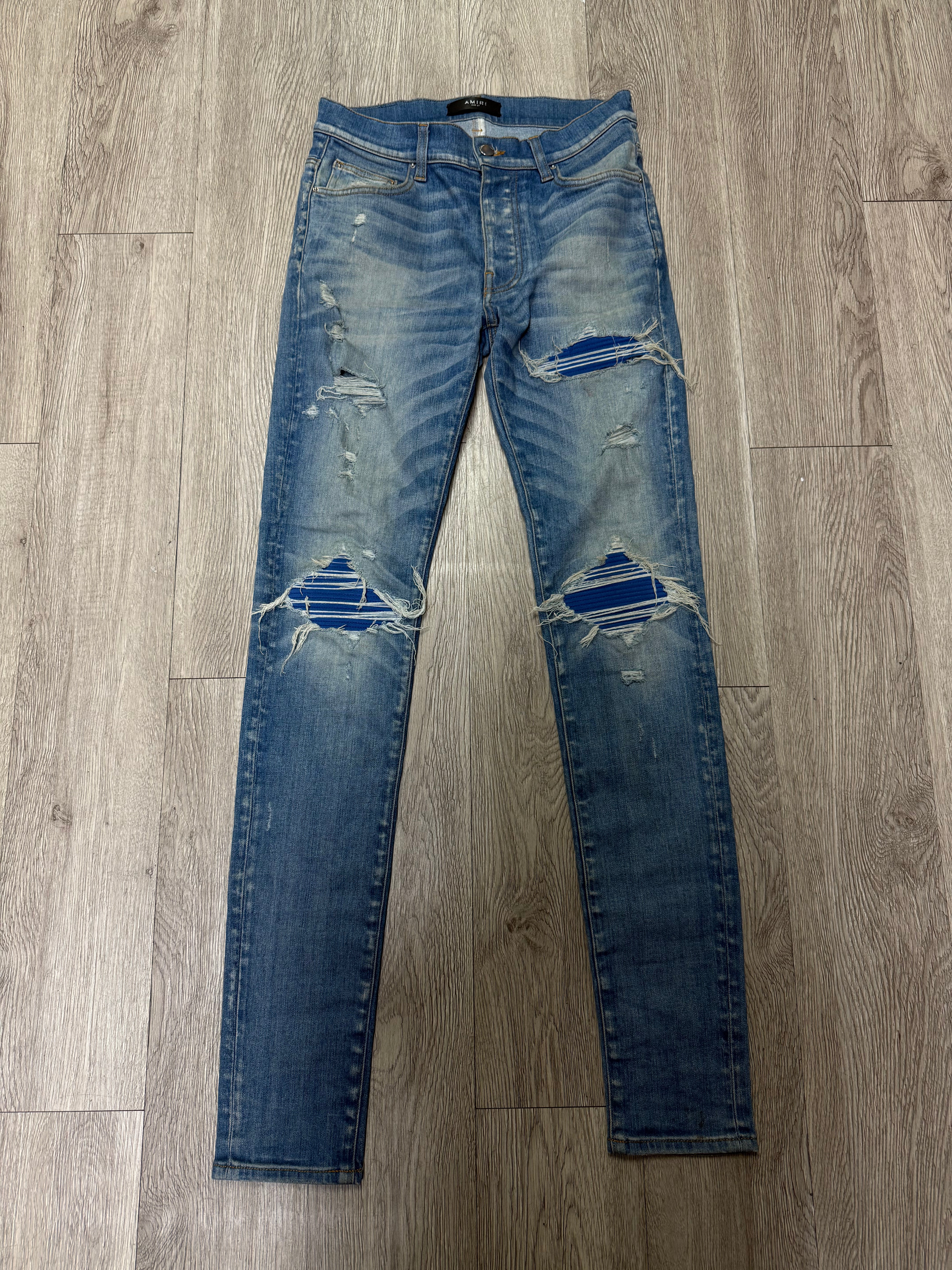 Amiri MX1 Light Wash Blue Suede Patch Jeans
