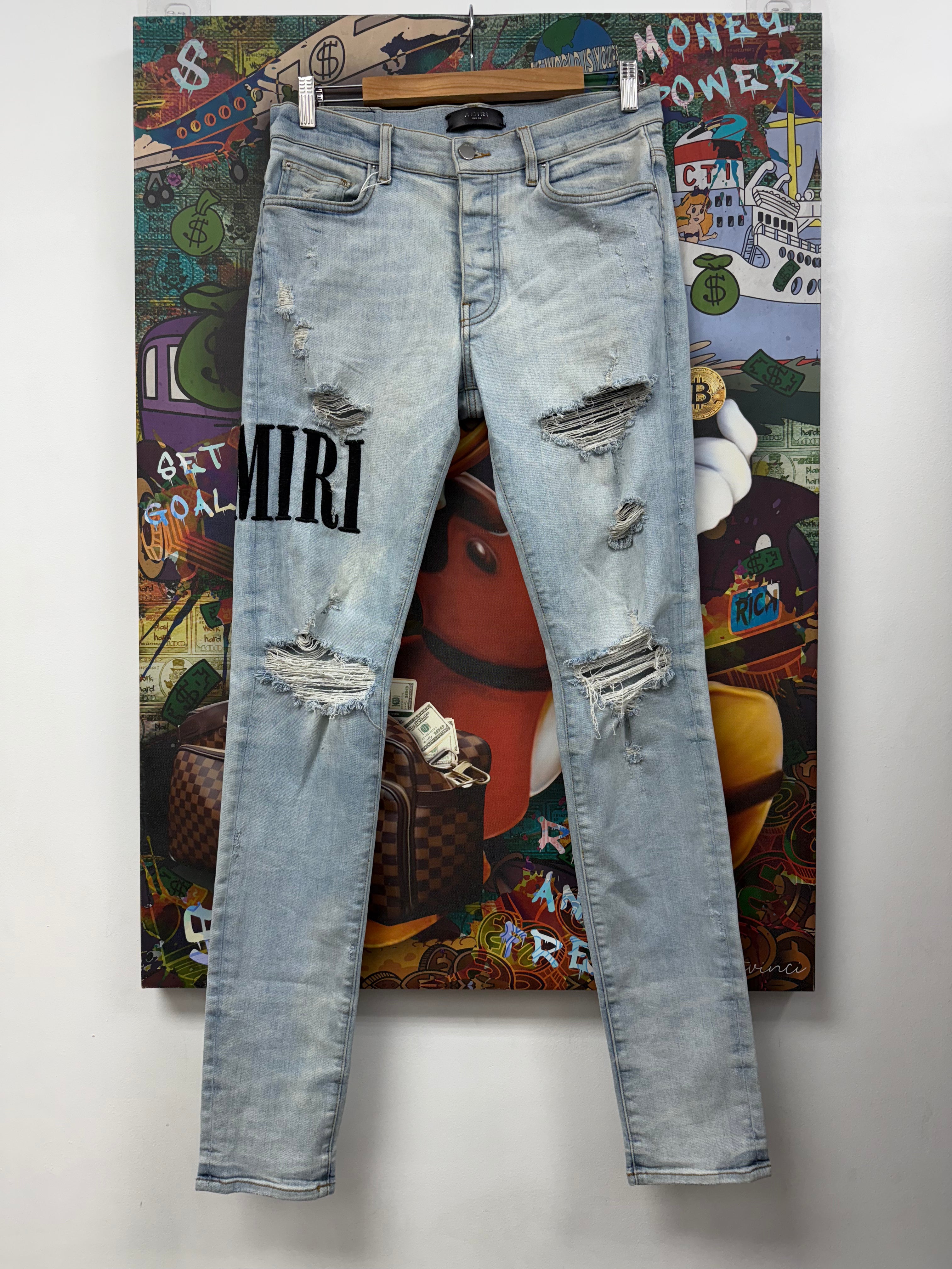 Amiri Light Wash Side Logo Jeans